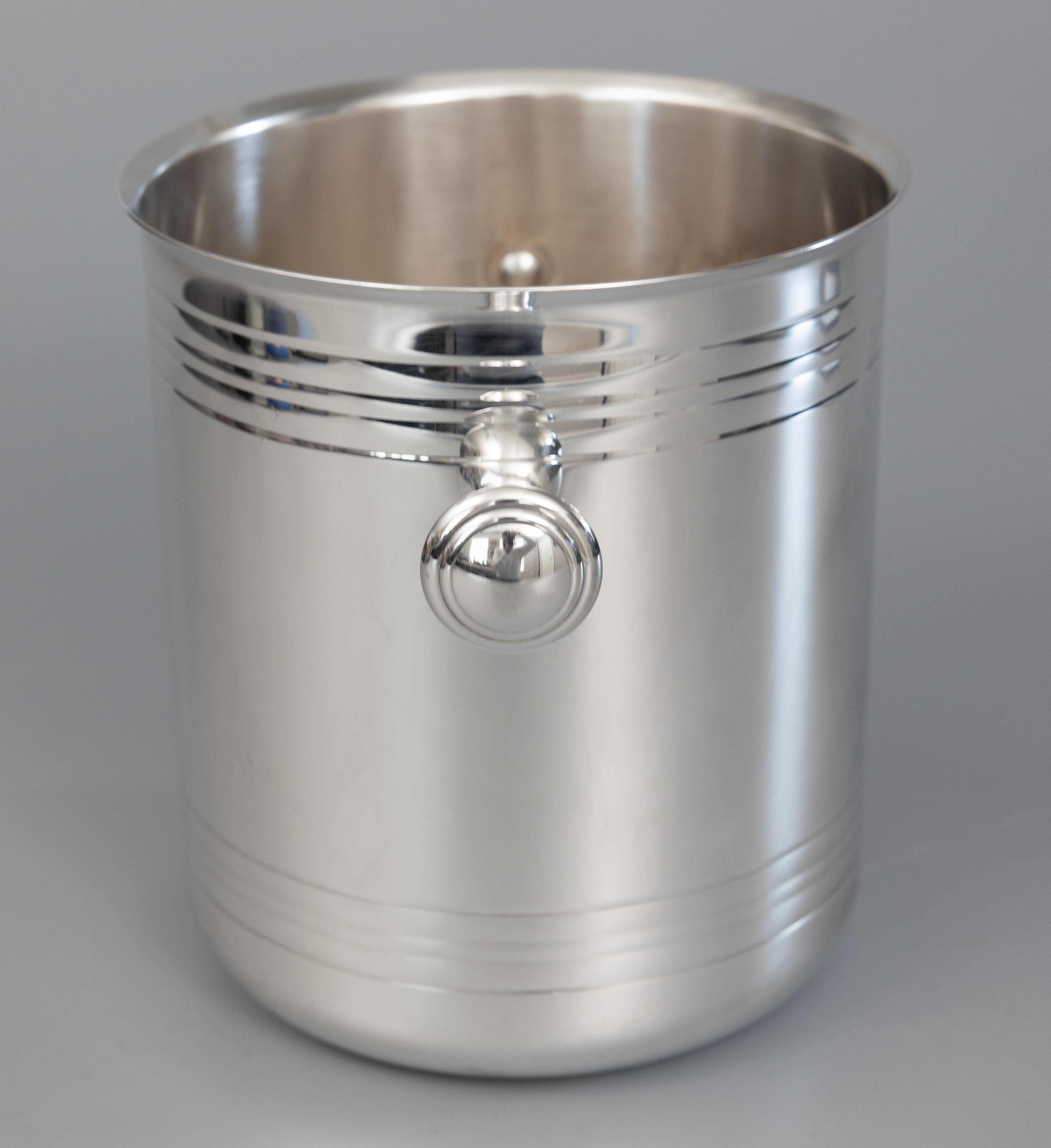 A superb vintage Art Deco style Christofle silverplate champagne ice bucket / wine cooler made in France. Hallmarked on reverse. This stylish ice bucket is solid and heavy with a sleek design, perfect for the modern home. Add the finest French