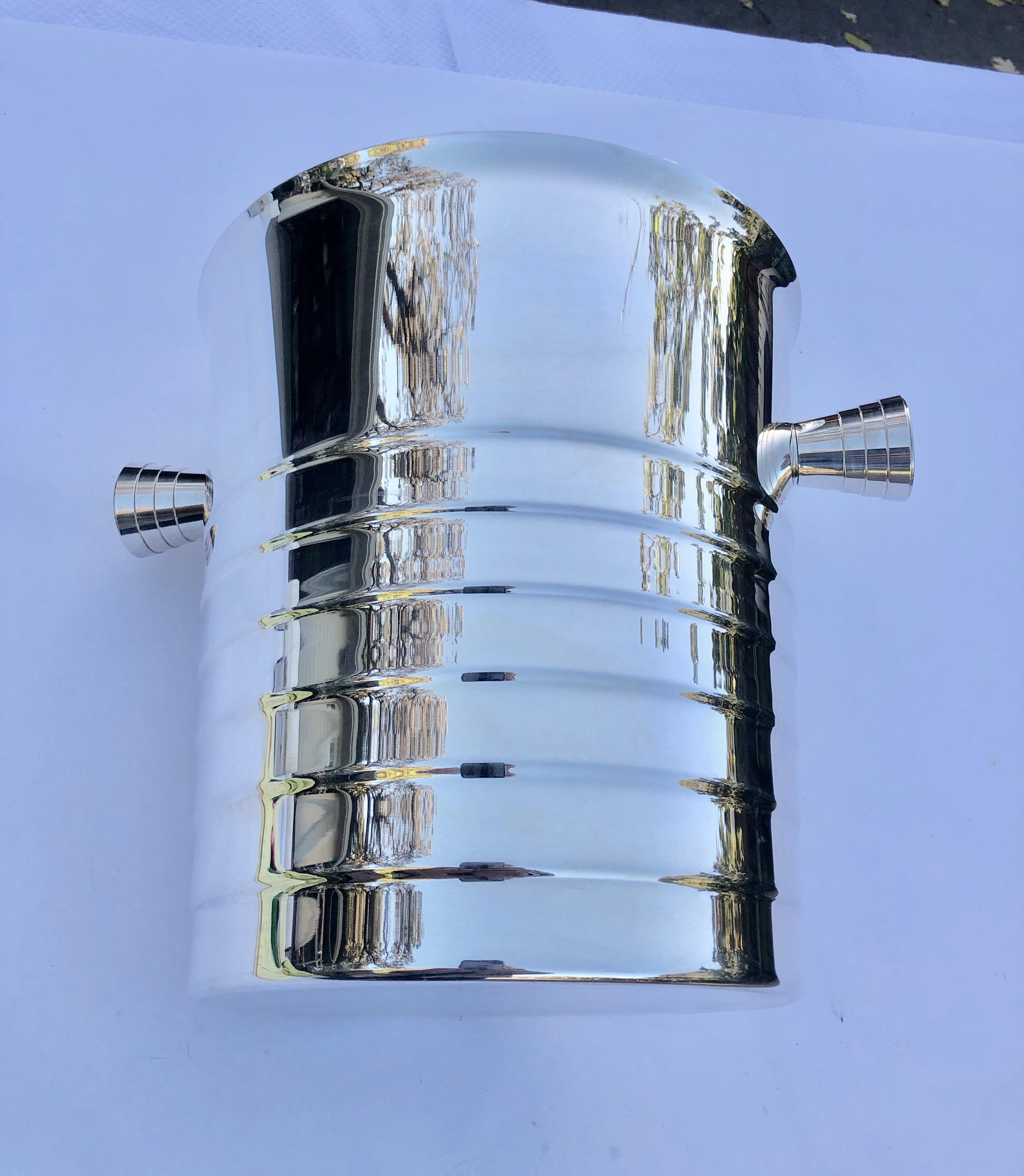This French silver plated champagne ice bucket or wine cooler is a Classic Christofle piece from the 1980s. This item has never been used.