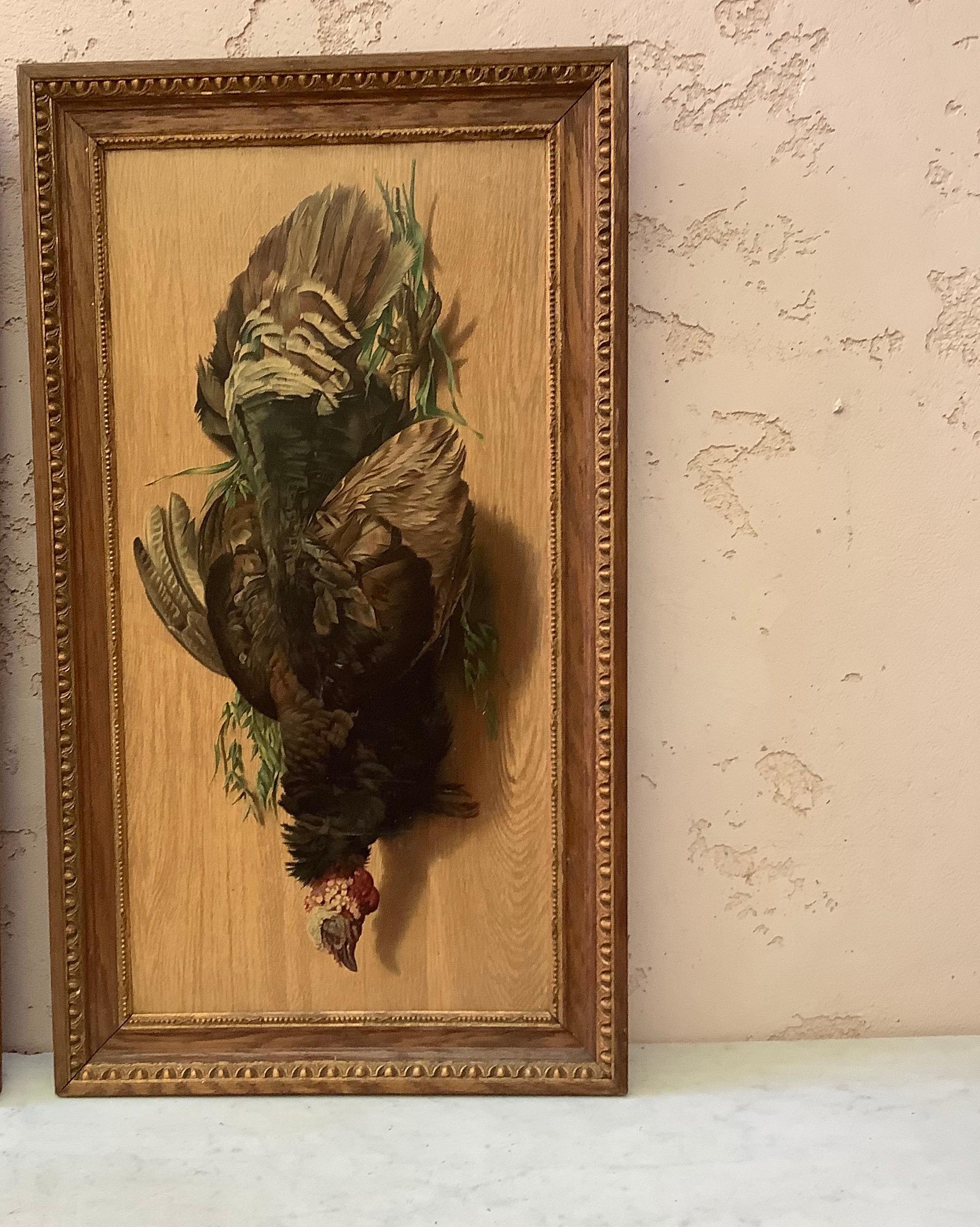 Large French chromolithograph print with a turkey hunting trophy attached with plants, circa 1890.
Very well framed in oak wood with gold borders.
Perfect for lake house or cabin.