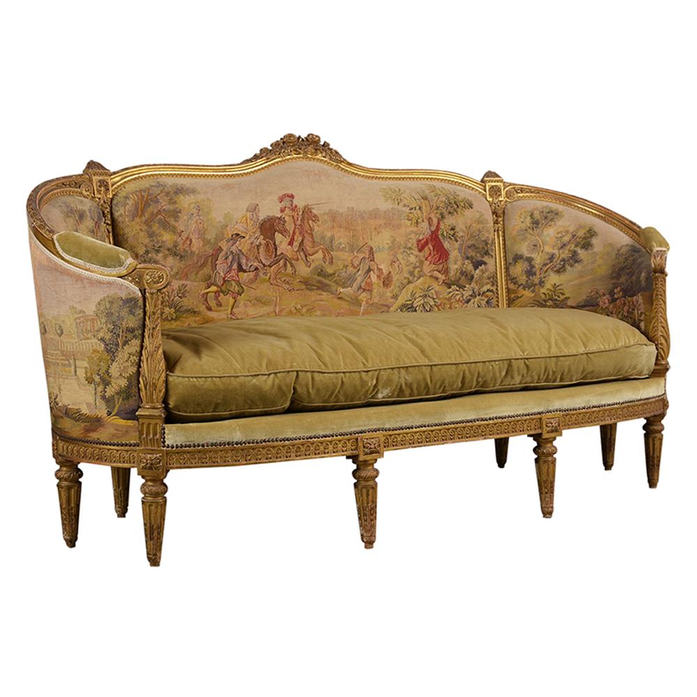 This French late 18th century Louis XVI style canopy sofa features exceptional hand carved details and original water gilt finish on the back and side of this sofa. It is upholstery with its original Abousson tapestry, the cushion is covered with