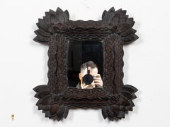 French Circa 1900 Tramp Art Mirror with Carved Layered Floral Frame
