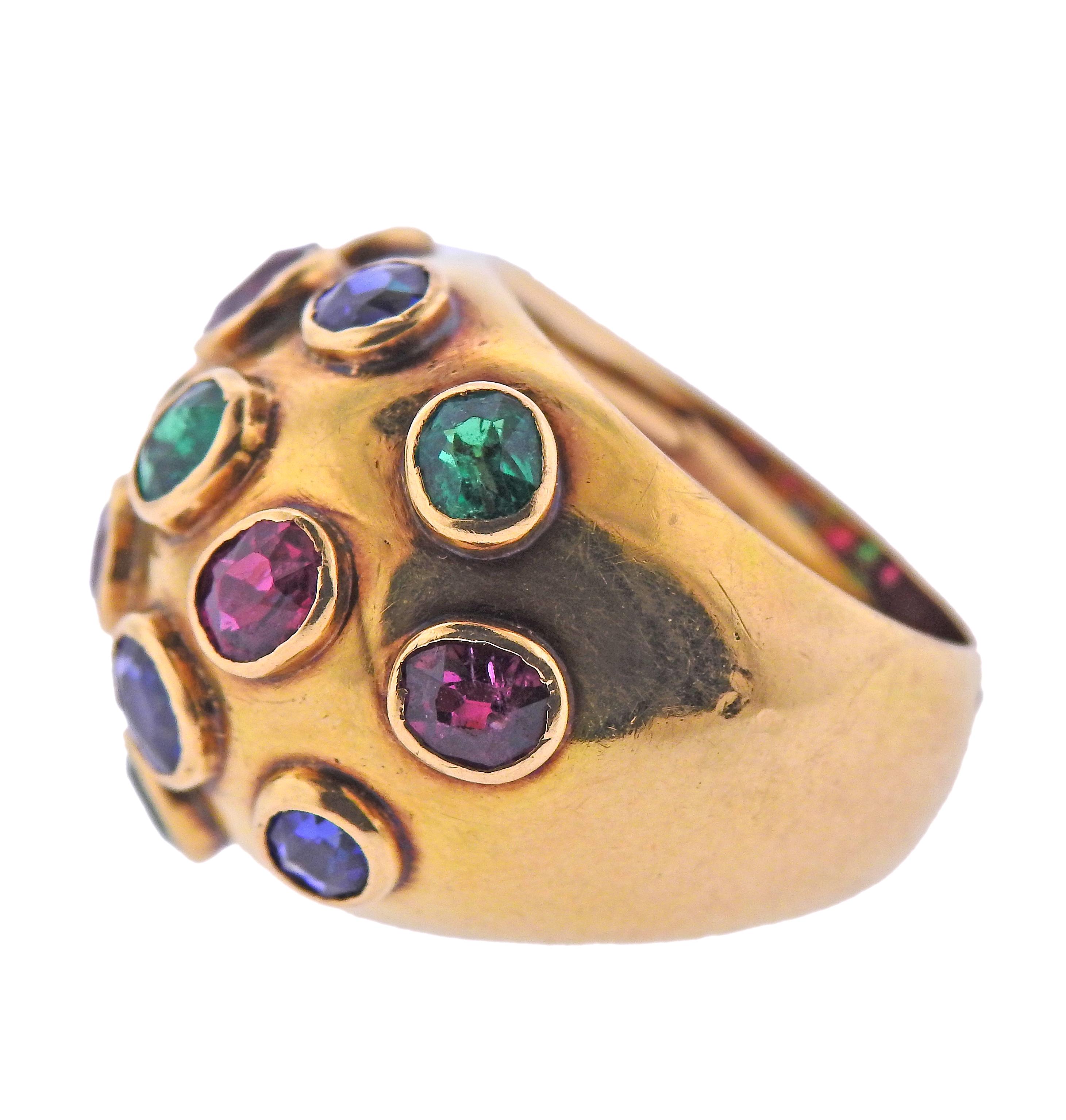 French made, possibly by Belperron, circa 1930s, 18k gold dome ring, set with rubies, sapphires and emeralds. Ring size - 6, ring top is 18mm wide. Marked with French gold marks. Weight - 11.7 grams. 