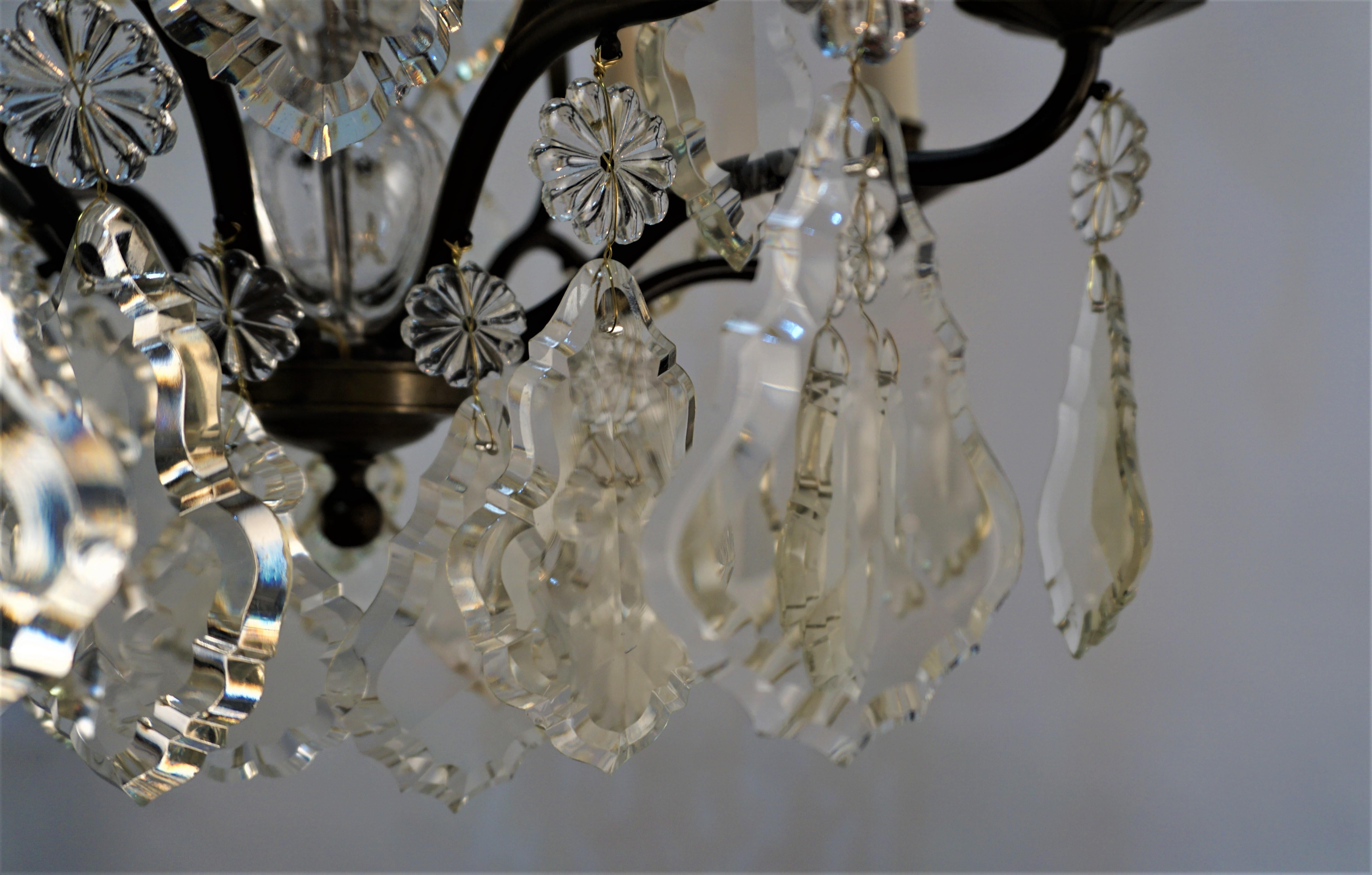 Early 20th Century French Circle 1920's Crystal and bronze Chandelier For Sale