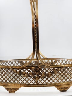 Centrotavola circolare francese, in bronzo dorato intrecciato