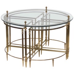 French Circular Glass and Brass Low Table with Four Wedge Nesting Under-Tables