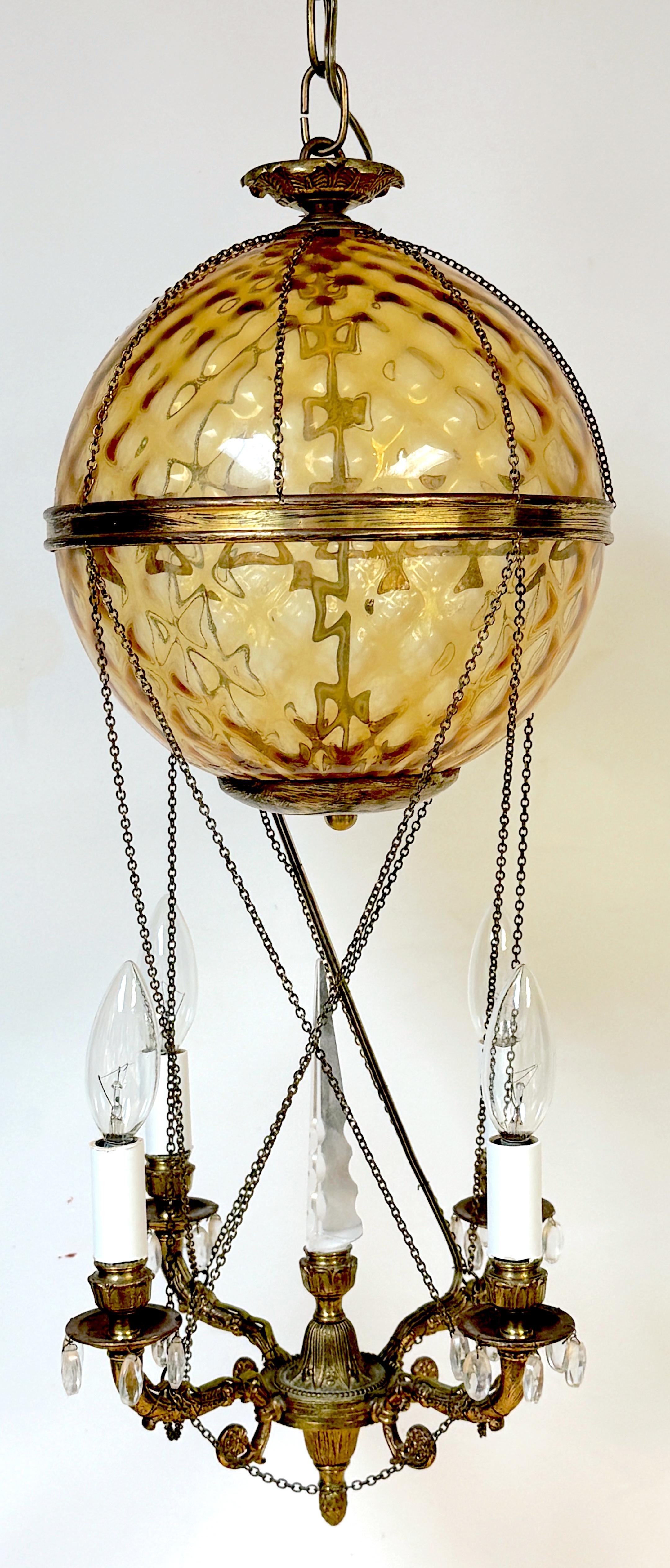 French Citrine Crystal Balloon Four Light Chandelier, Style of Maison Baguès
France, circa 1960s

This exquisite French Citrine Crystal Balloon Four-Light Chandelier, in the style of Maison Baguès, circa 1960s, is a remarkable blend of French Modern