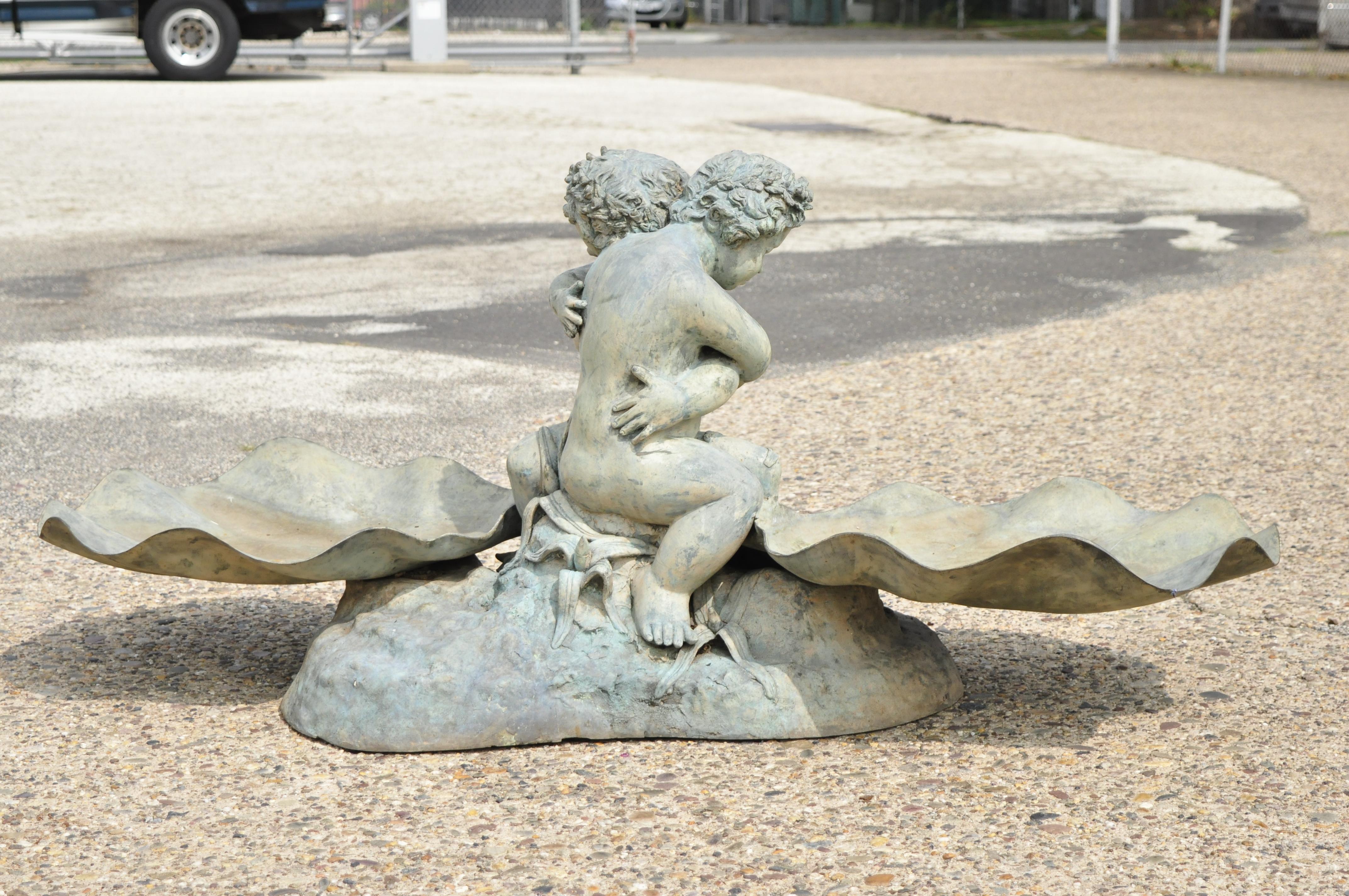 French Classical Cast Bronze Large Garden Water Fountain with Embraced Cherubs In Good Condition For Sale In Philadelphia, PA