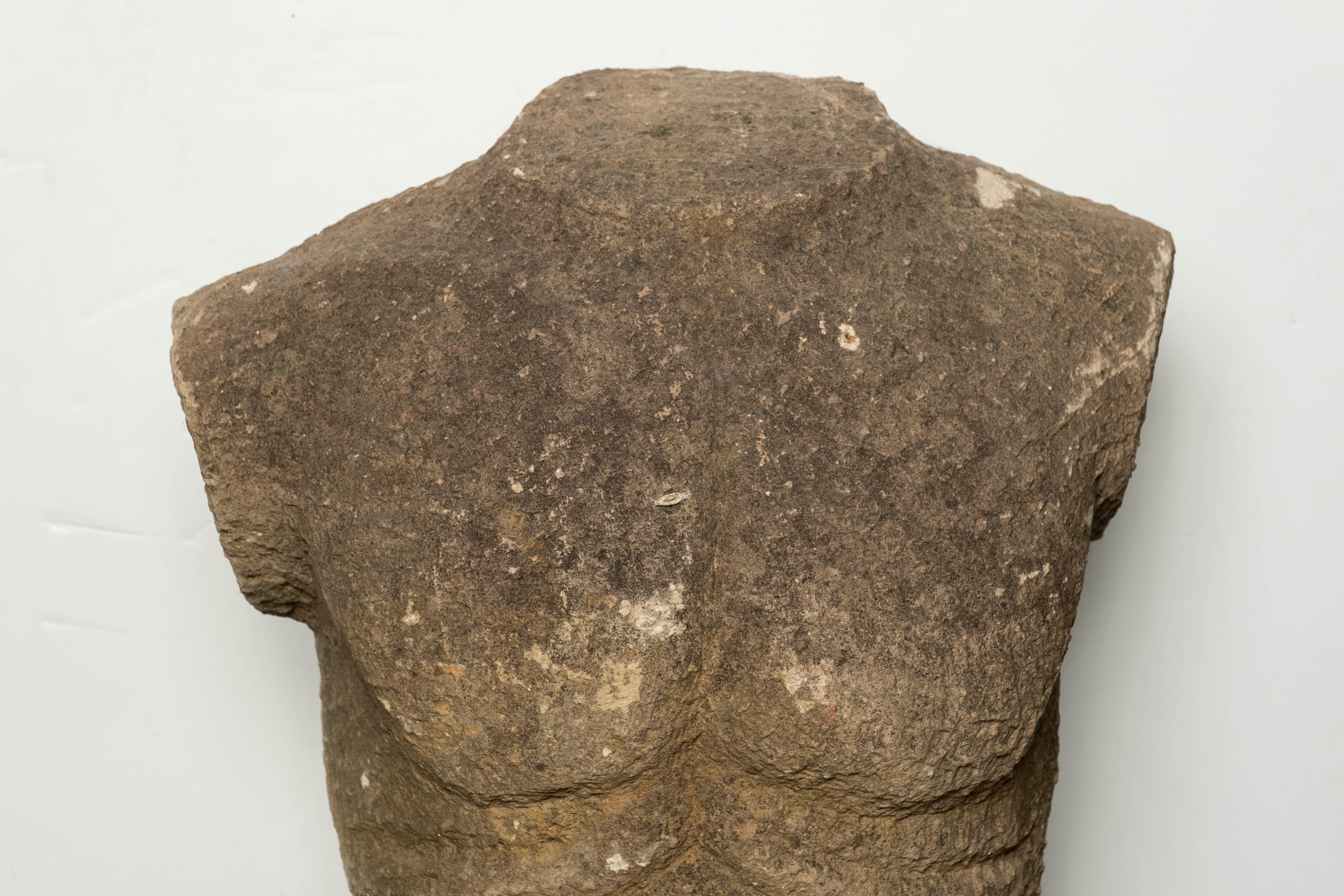sandstone statuette of male torso