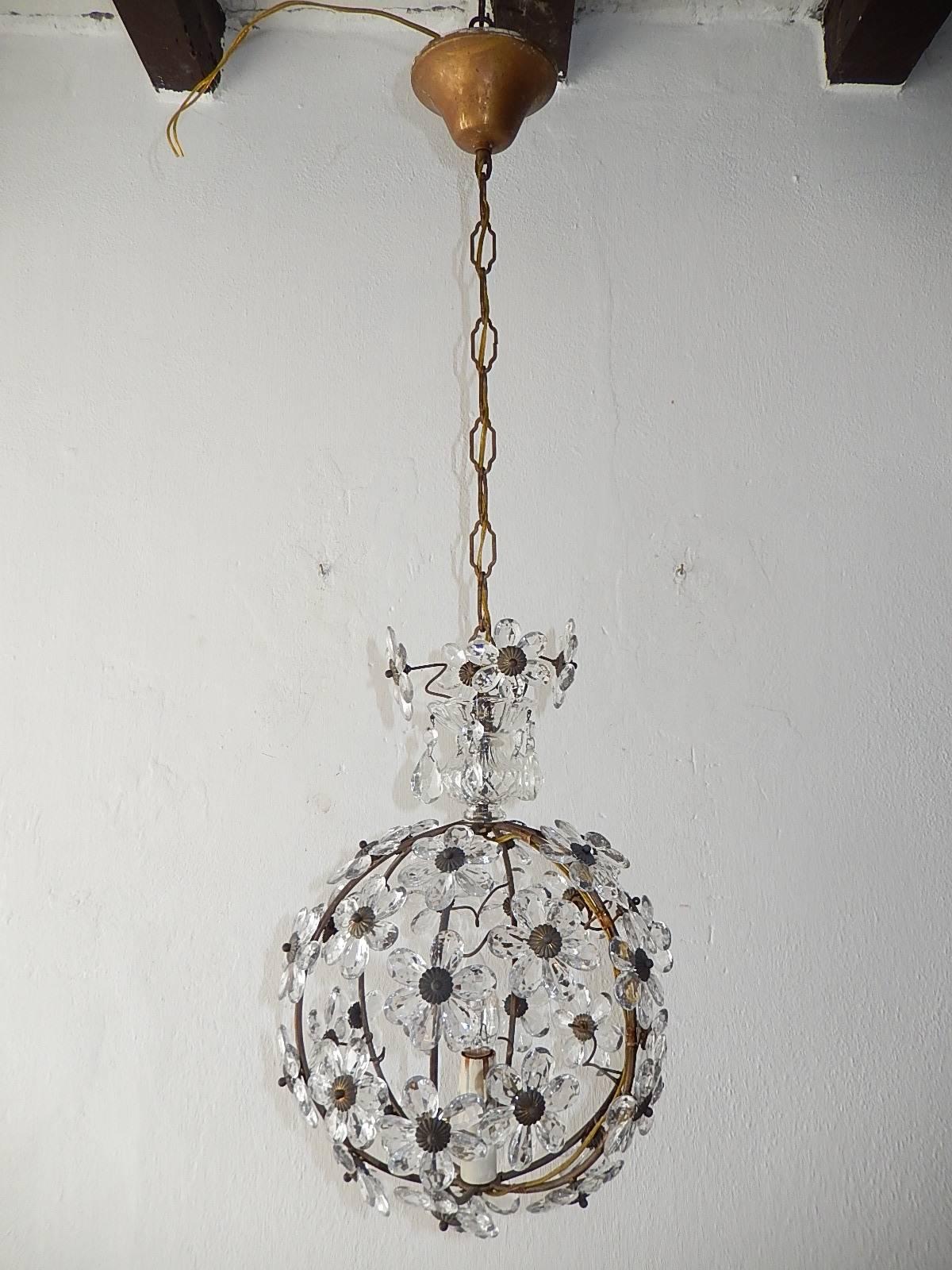 Housing one light. Rewired and ready to hang. Clear crystal prisms. Murano glass and crystal bobeches on top with crystal prisms in clear. Adding another 17 inches of original chain and canopy. Free priority shipping from Italy.