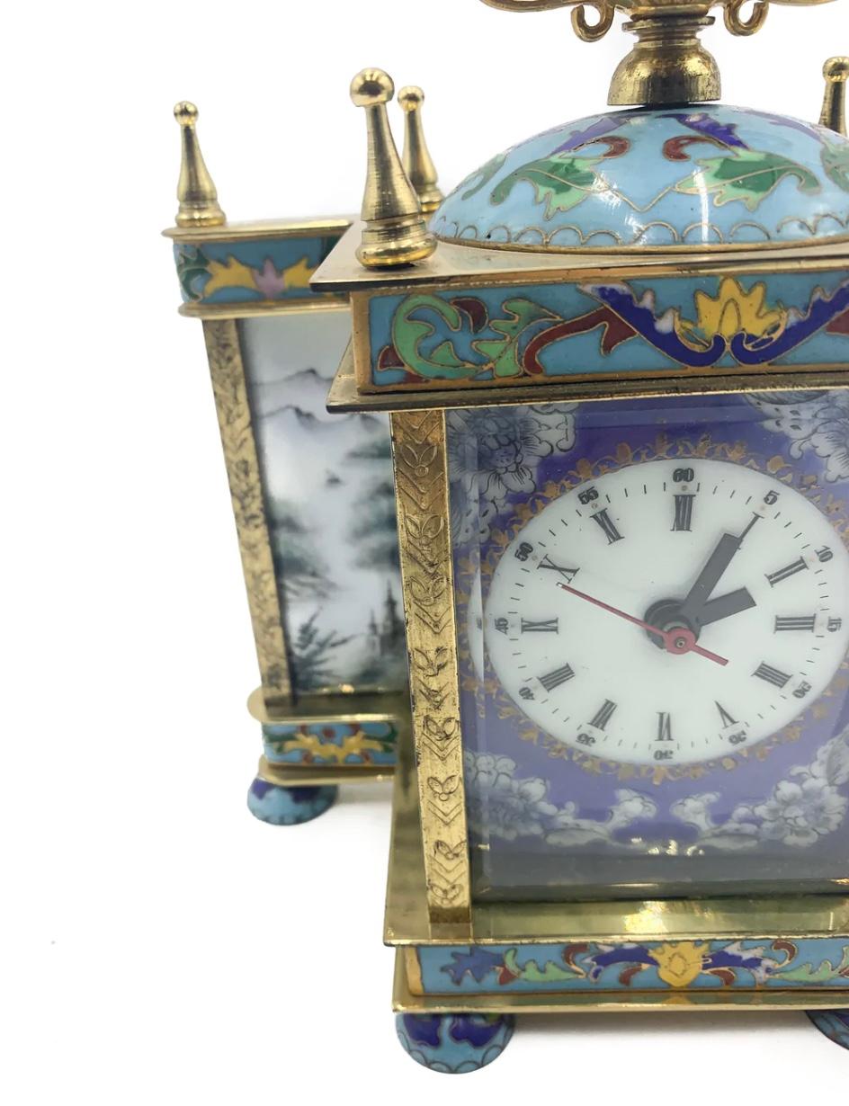 Beautiful French cloisonne table clock, created and hand painted in the 1930s

Ø 20 cm Ø 8 cm h 17 cm

Very good conditions.
