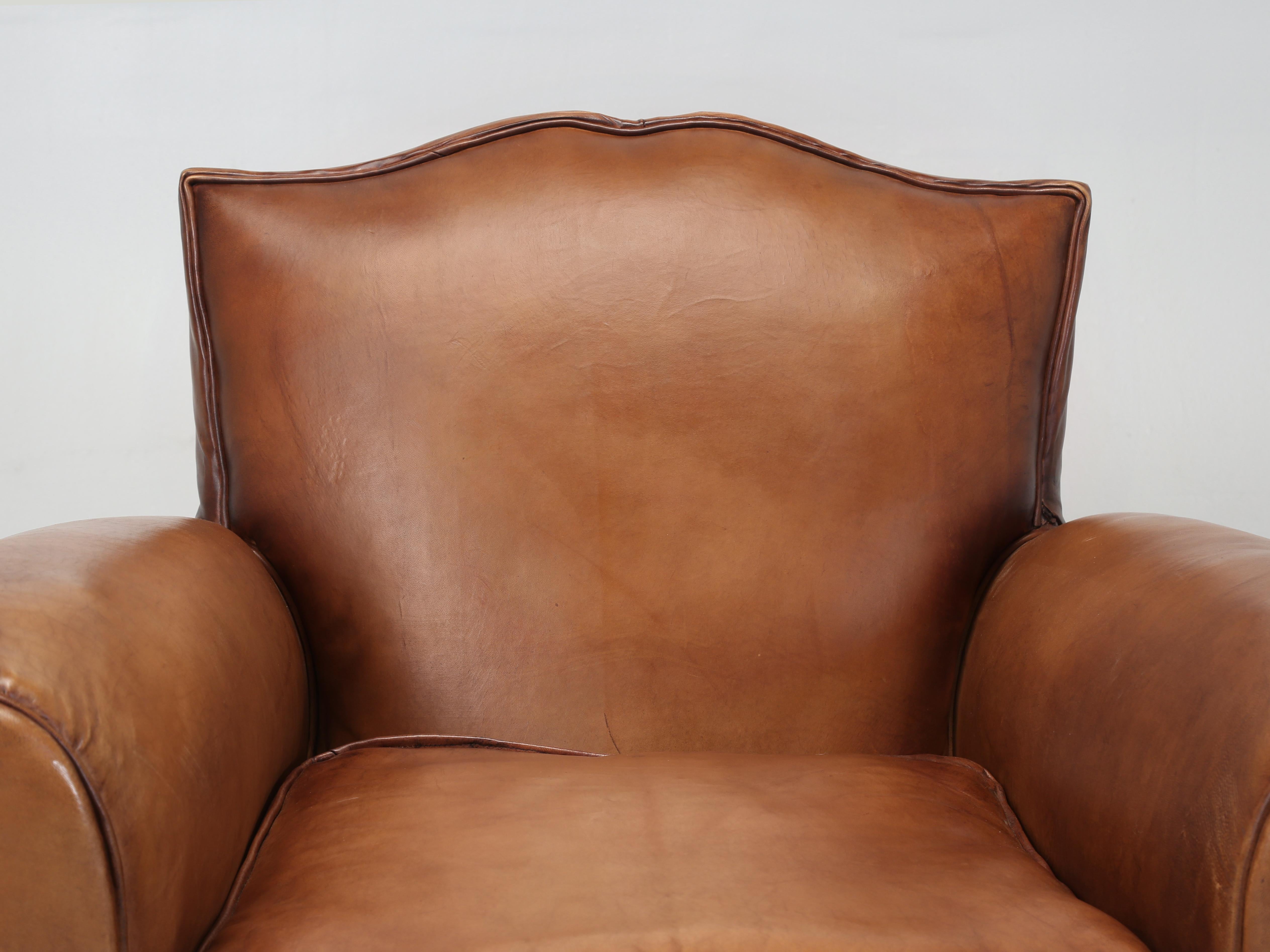 French Leather Club Chair Restored in Toulouse, France with all New Sheep Leather. Normally this is where I would be telling you how our Old Plank Upholstery department completely disassembled the Club Chair and rebuilt the leather Club Chair from