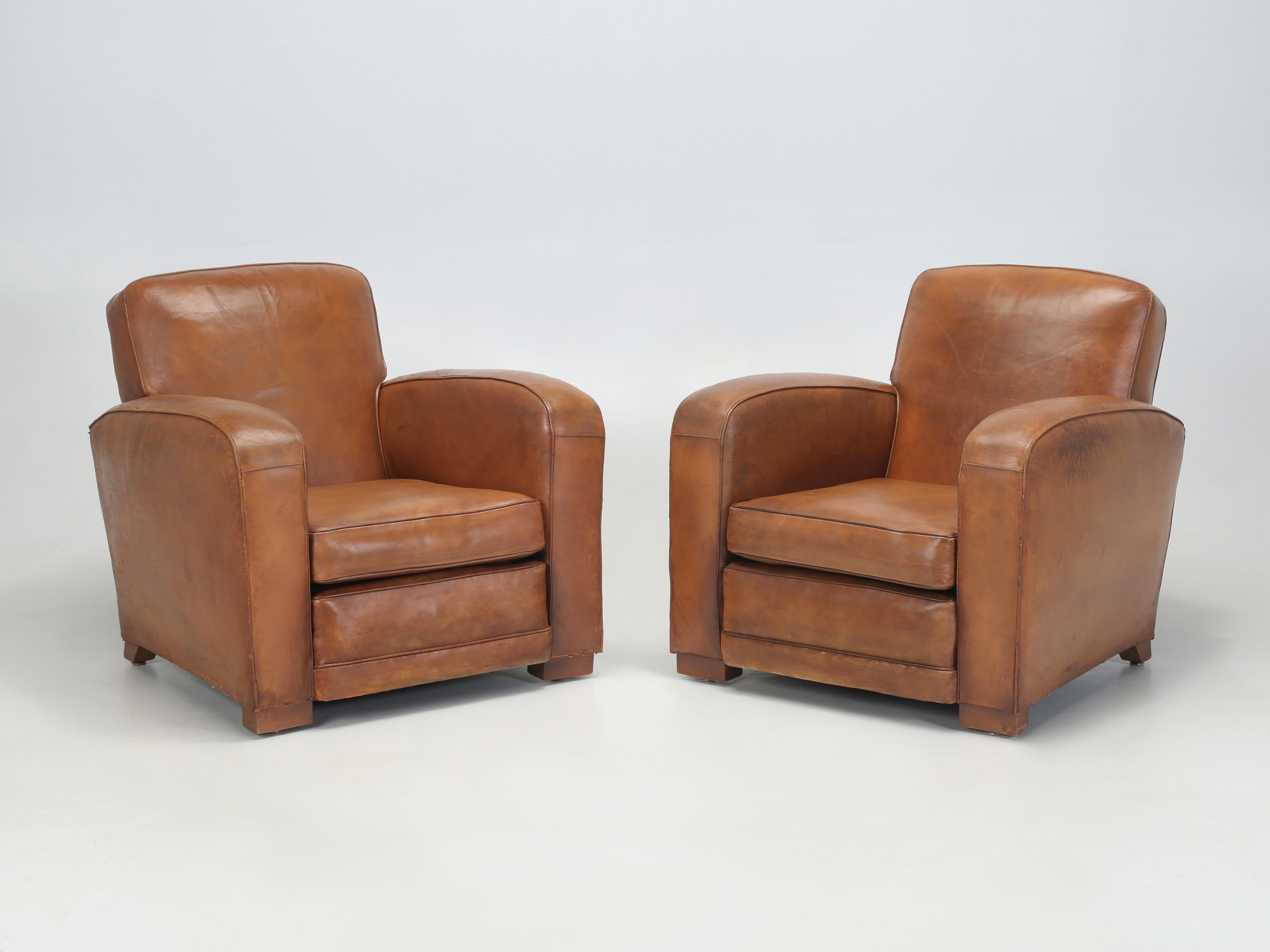 French Club Chairs from the 1930's that have been properly restored internally, while maintaining the 90-year old leather coverings. Each of our French Leather Club Chairs required approximately 40-man-hours of labor to restore in our Old Plank