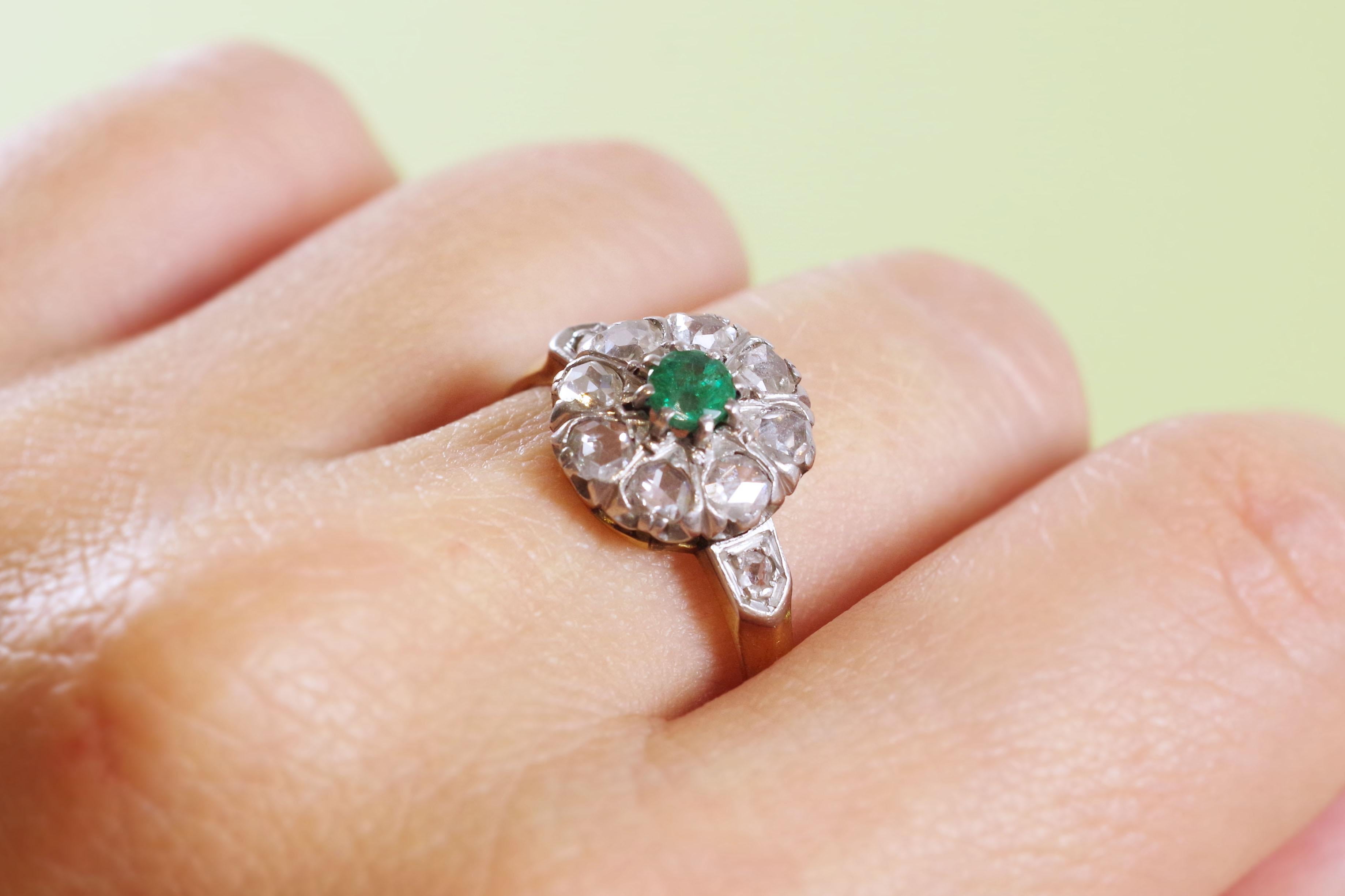 Women's French cluster emerald ring in 18 karat pink gold and platinum