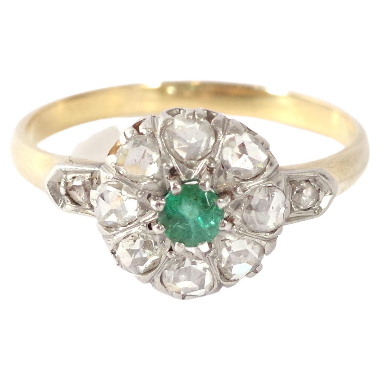 French cluster emerald ring in 18 karat pink gold and platinum