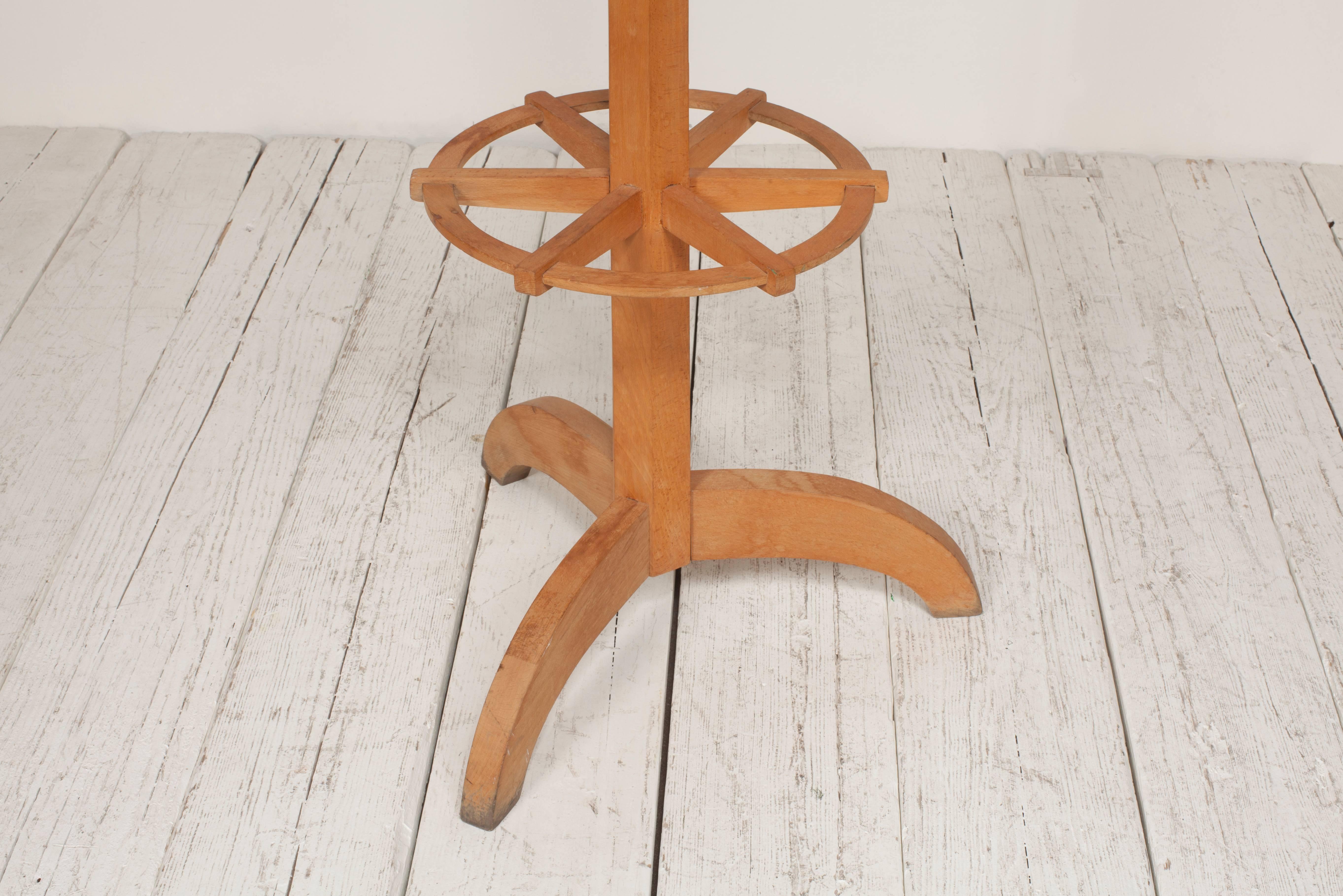 French coat rack with Cubist geometric details.