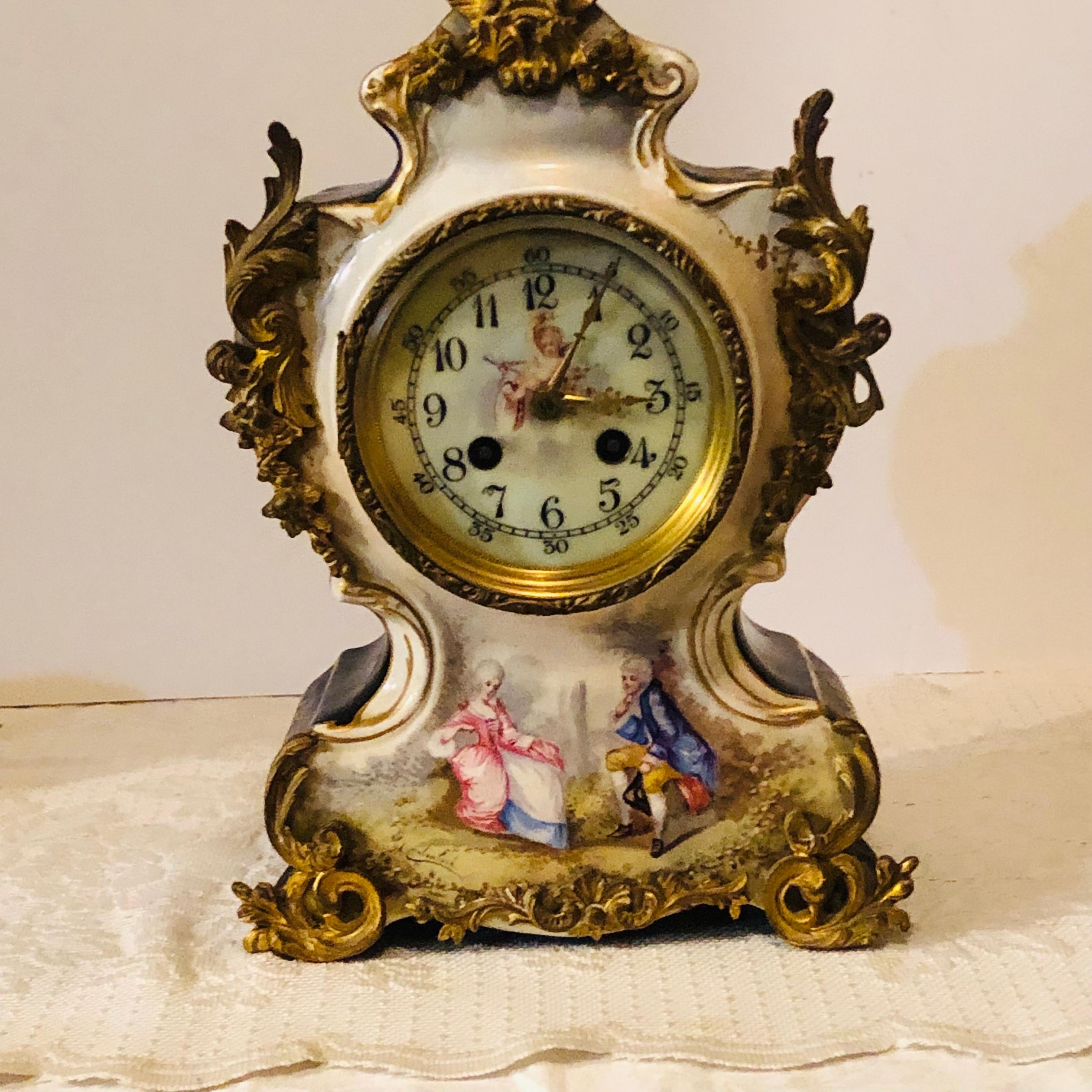 Hand-Painted French Cobalt Porcelain Clock with Hand-painted Scene of Lovers and Cherubs For Sale