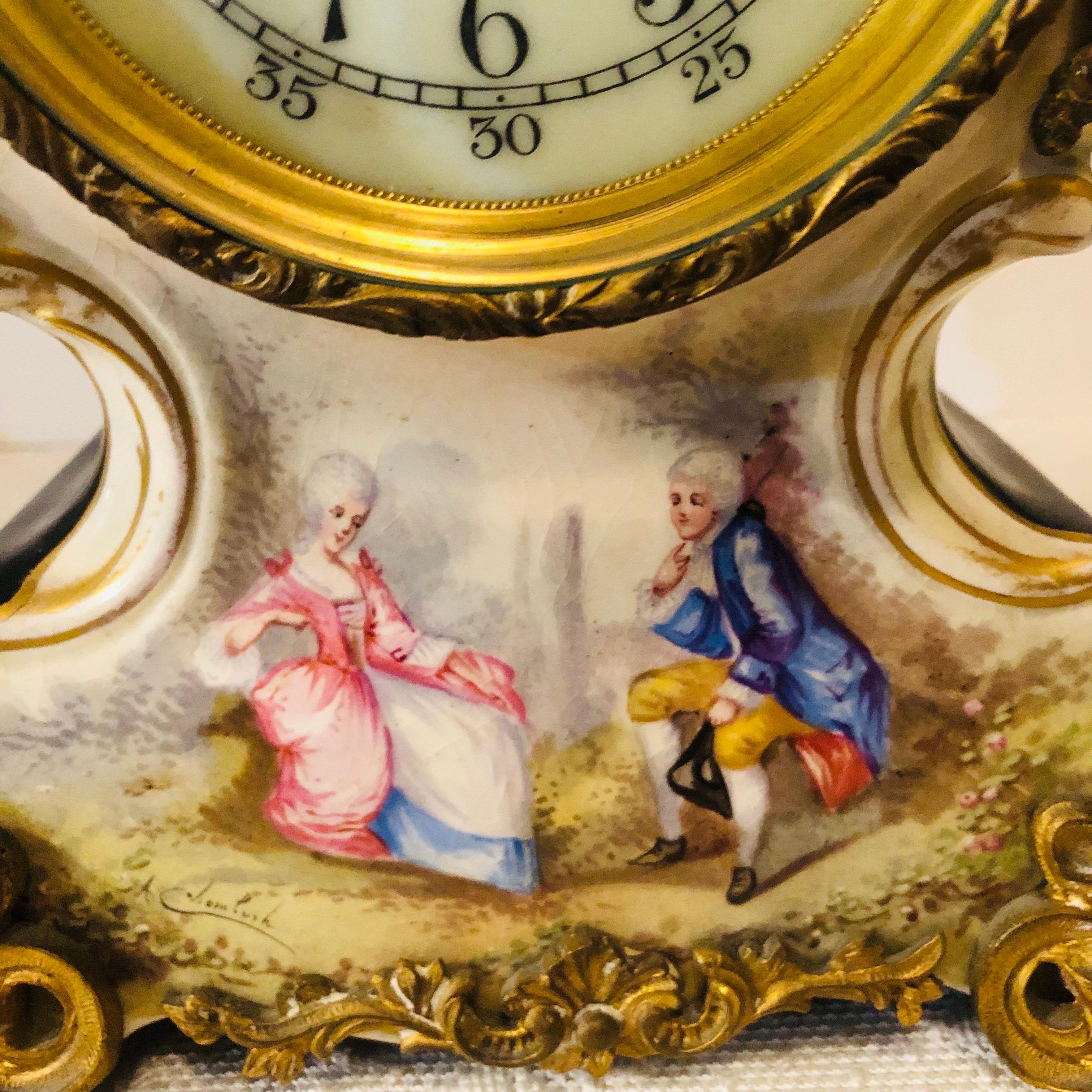 French Cobalt Porcelain Clock with Hand-painted Scene of Lovers and Cherubs In Good Condition For Sale In Boston, MA