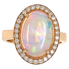 French Cocktail Ring Opal Cabochon Surrounded by Diamonds Yellow Gold 18 Karat