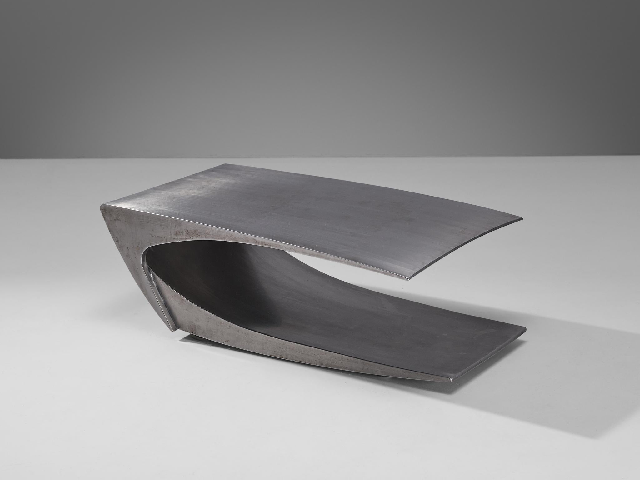 Coffee table, stainless steel, France, 1970s.

A sleek coffee table with a distinctive look, inspired by the 70s French stainless steel furniture style. Noted designers such as Michel Boyer, François Monnet, Roger Tallon, Maria Pergay, and Maison