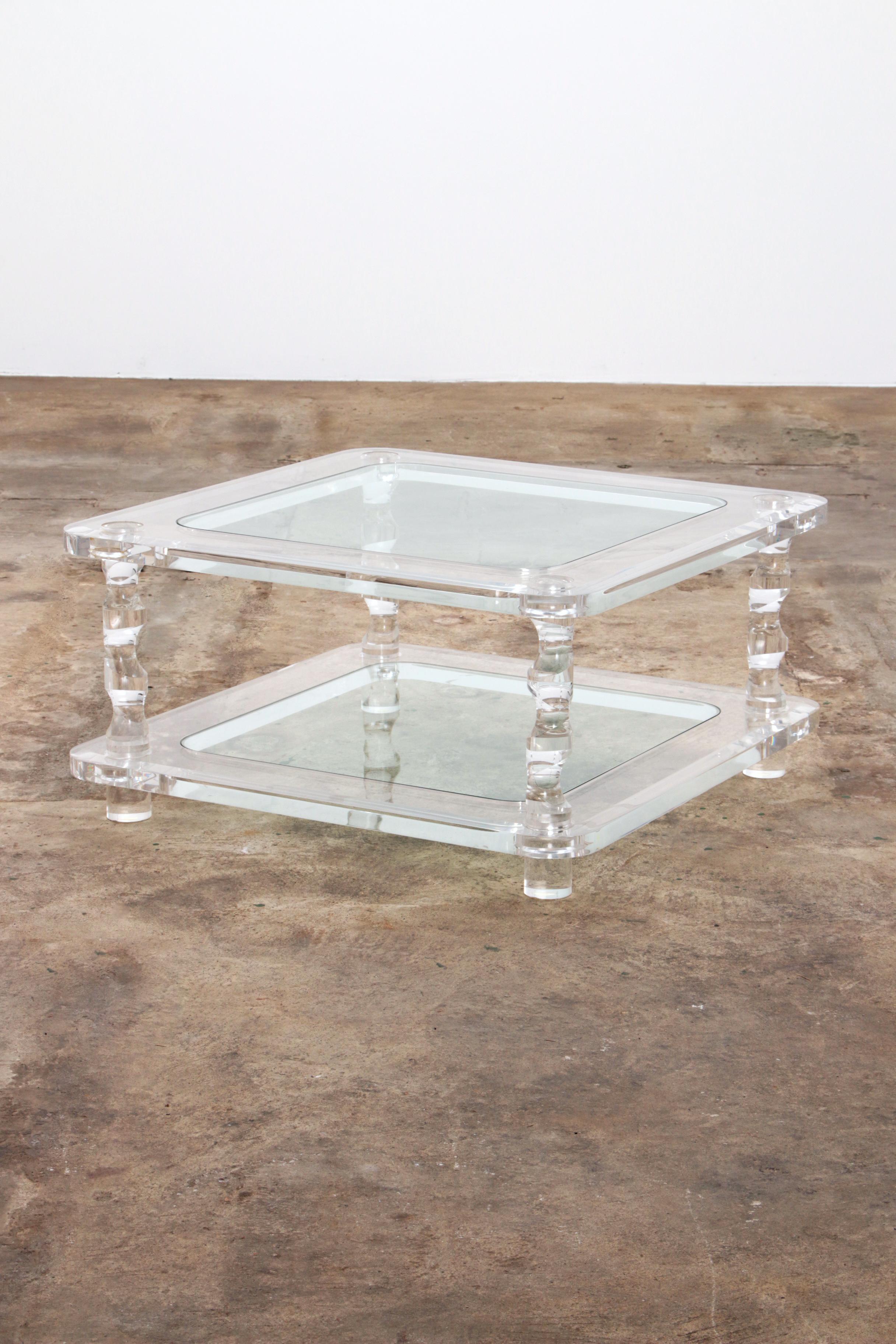 
A beautiful coffee table in Lucite structure and glass from the French design house Maison Romeo. The table was produced around the 1970s and the design has a modern and stylish look.

The table consists of two beautiful clear glass plates. All