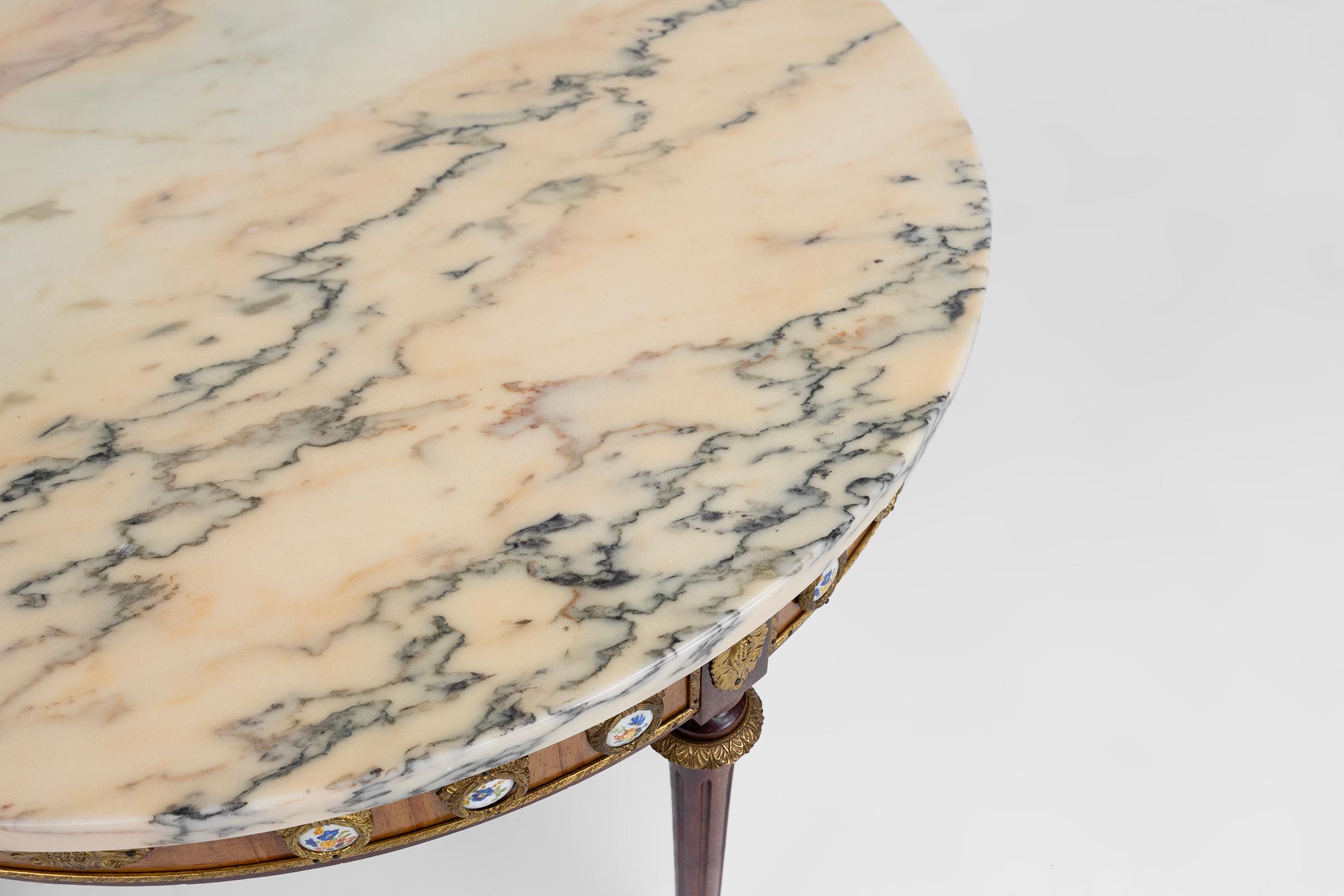 Bronze French coffee table with pink marble top and Limoges plaques, ca. 1950