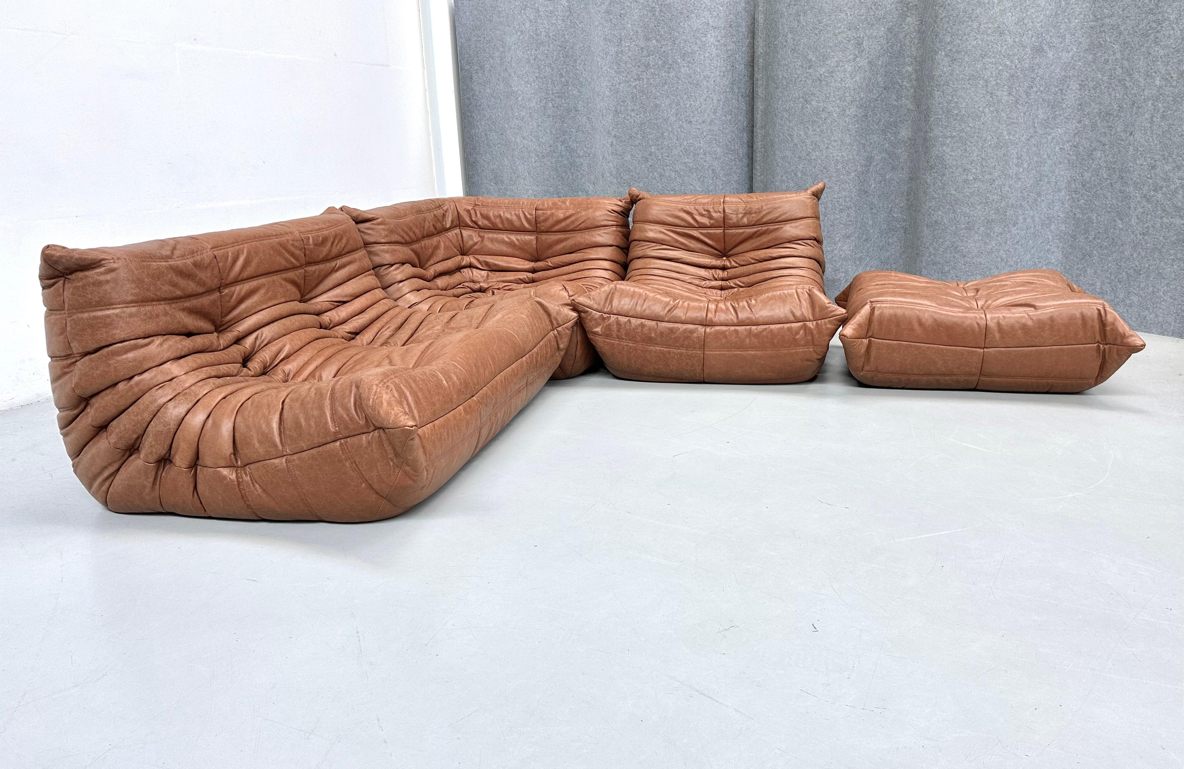 The Togo was designed by Michel Ducaroy in 1973 for Ligne Roset. It is the first sofa/chair ever made only of foam and leather. The Togo collection features an ergonomic design with polyether foam construction and padded covers, making the Togo both