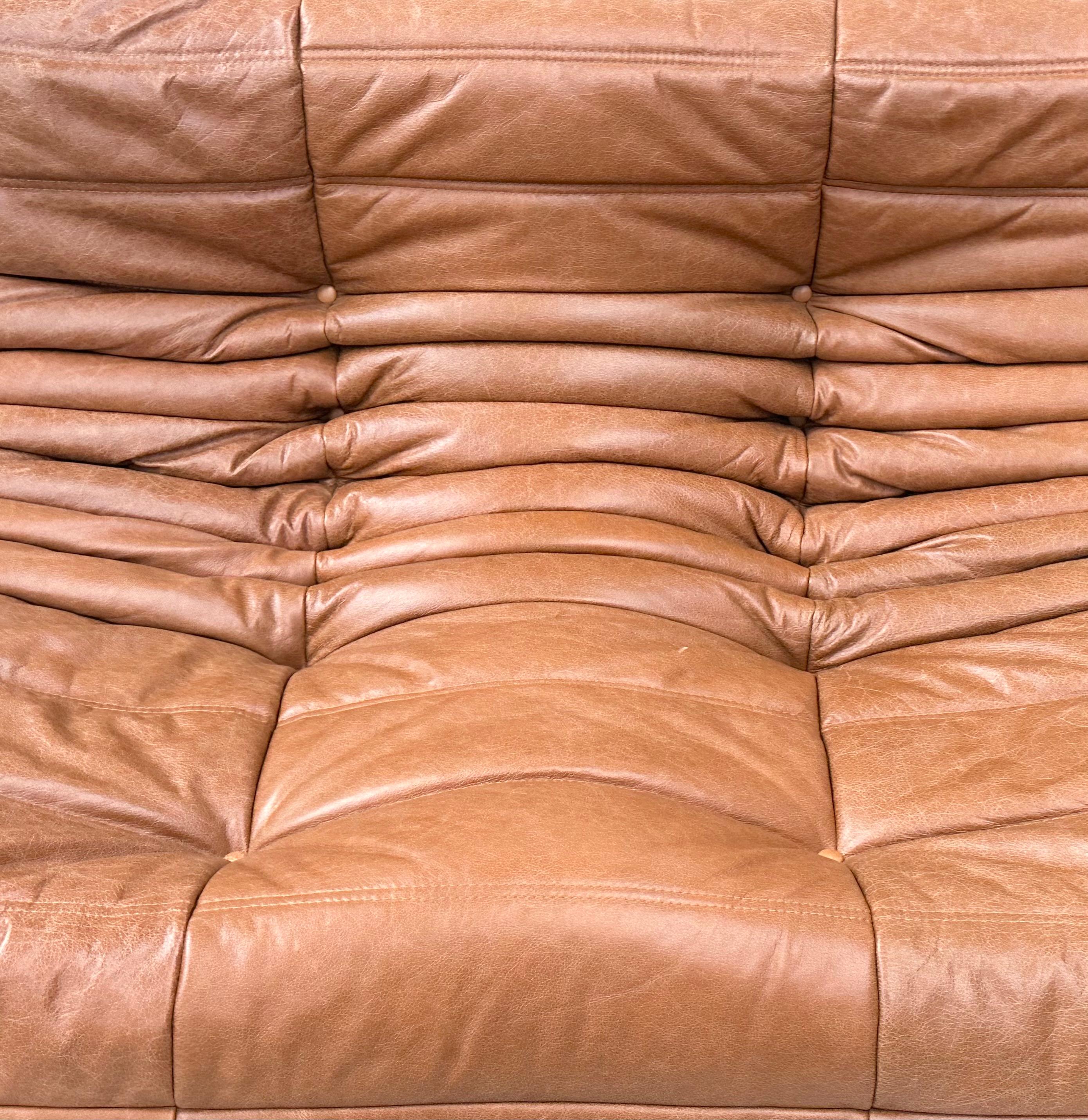 brown leather togo couch