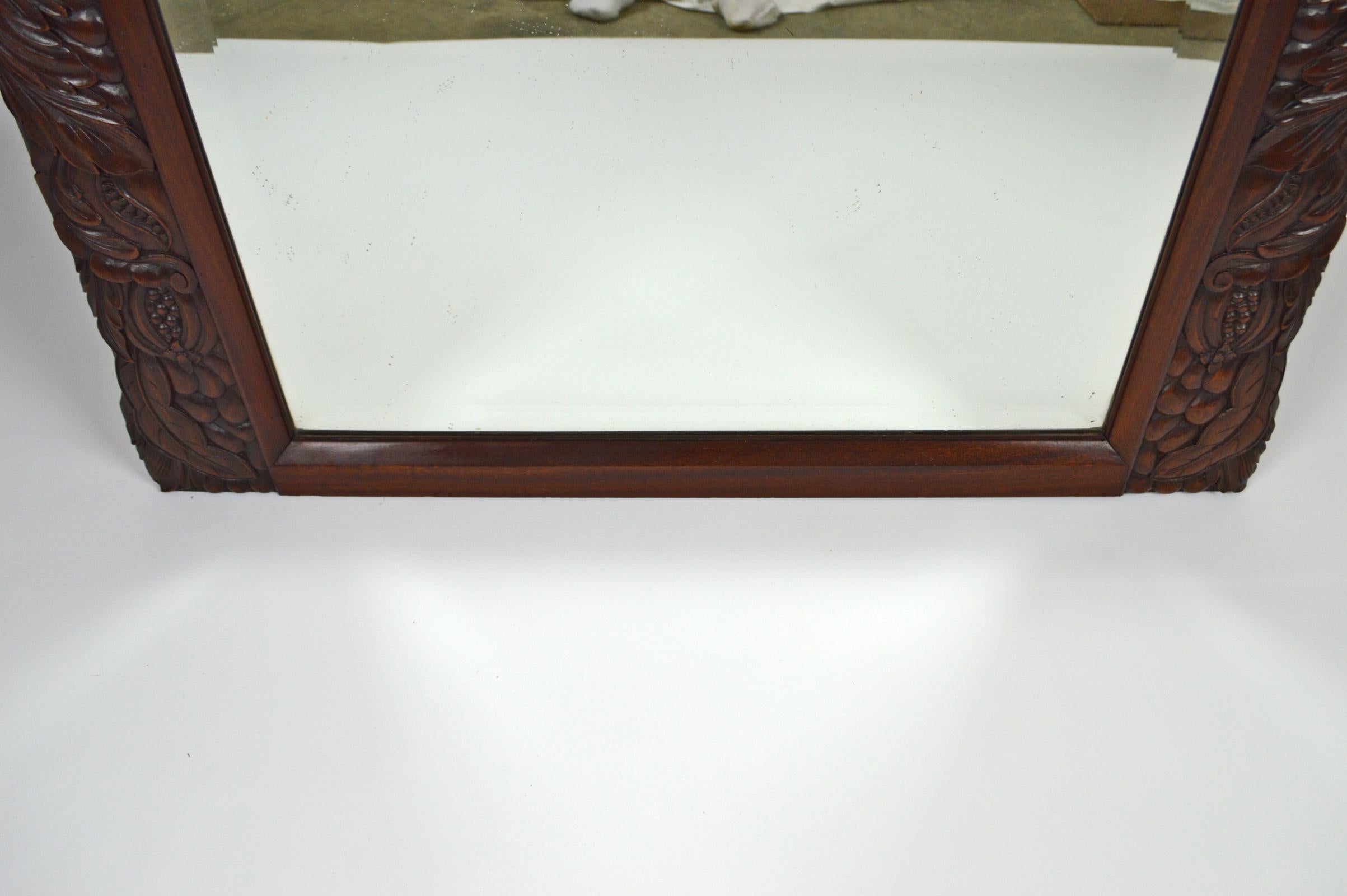 Early 20th Century French Colonial Art Deco Carved Mahogany Fireplace Mantel Mirror, circa 1920