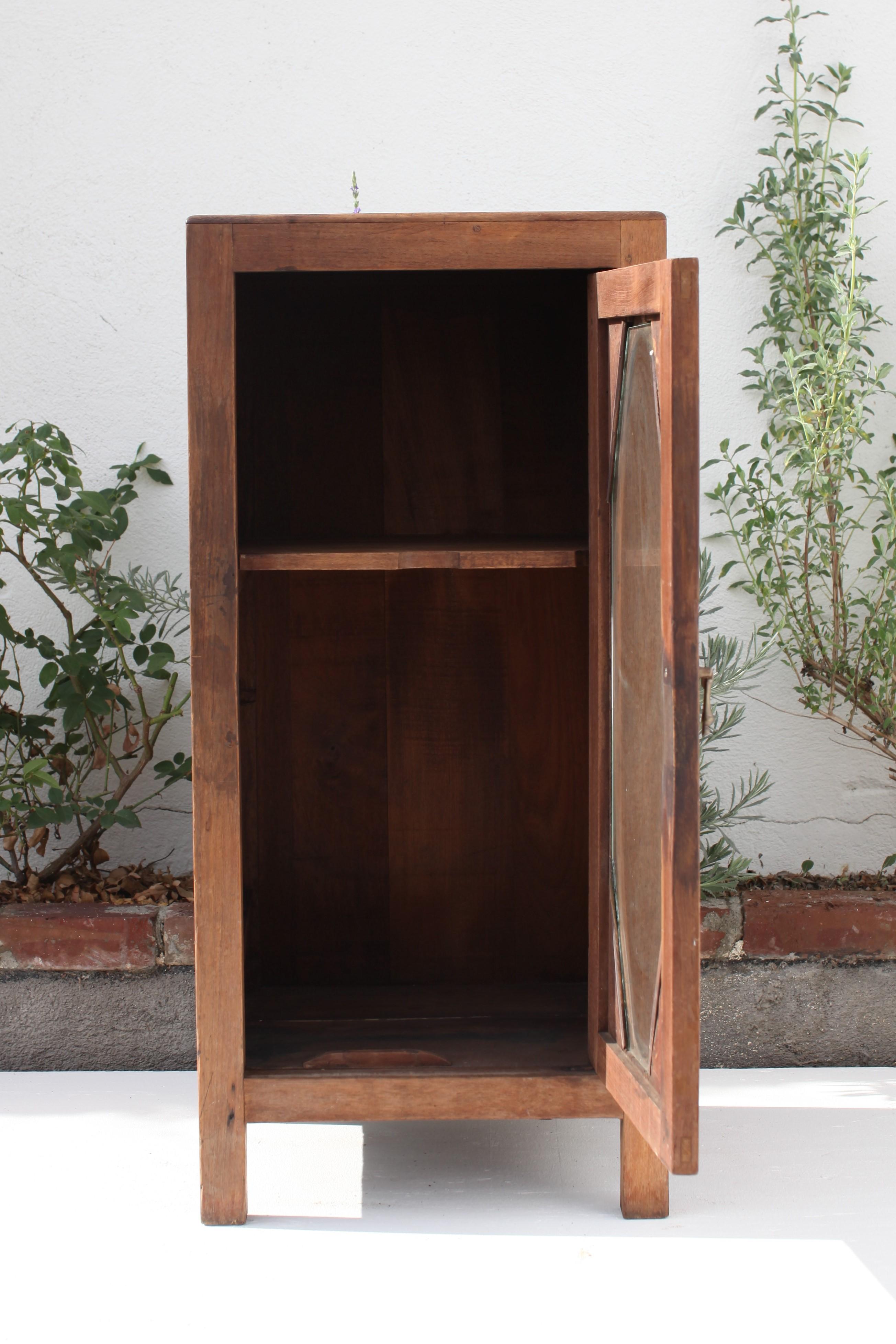 20th Century French Colonial Oval Window Weathered Teak Cabinet, 1930's For Sale