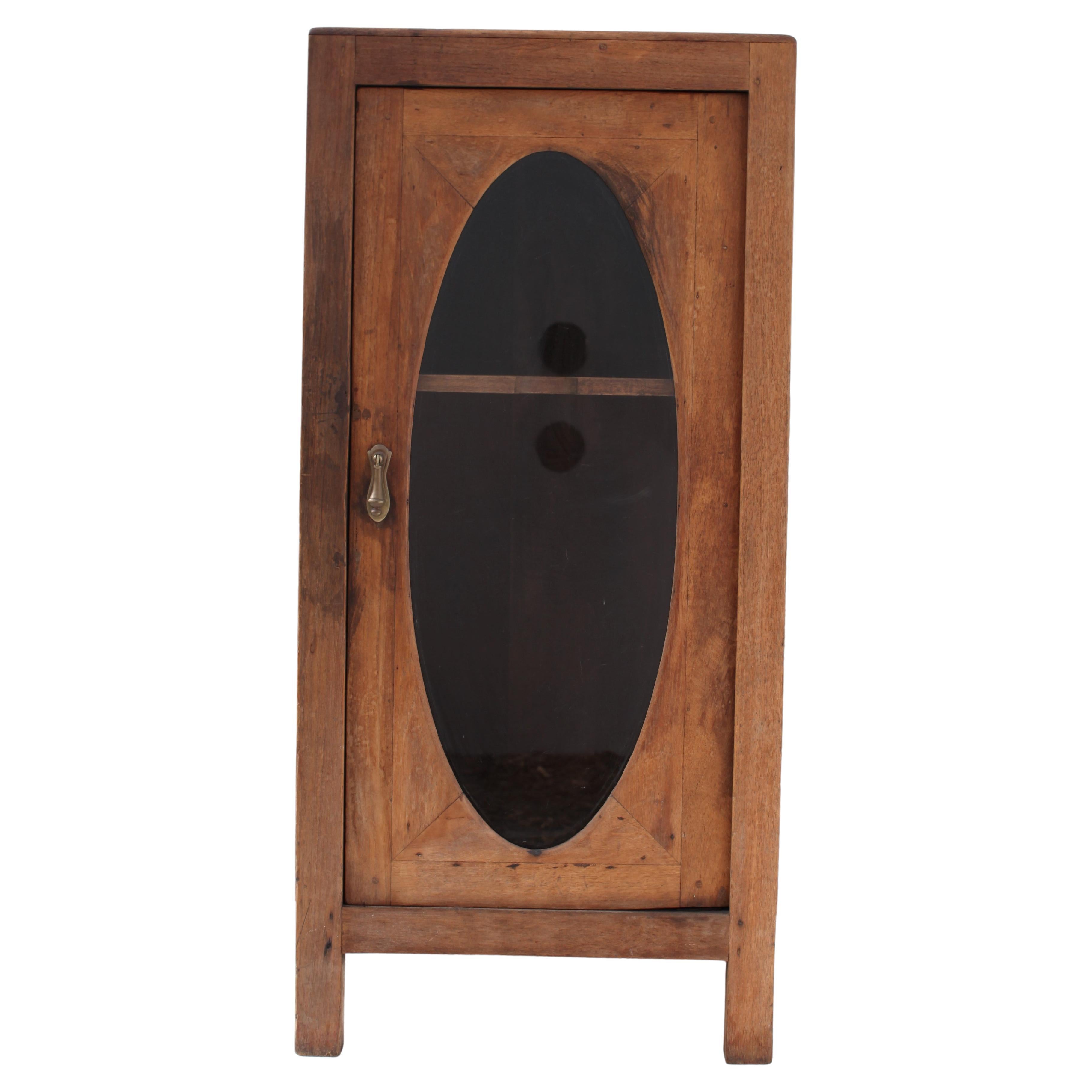 French Colonial Oval Window Weathered Teak Cabinet, 1930's For Sale