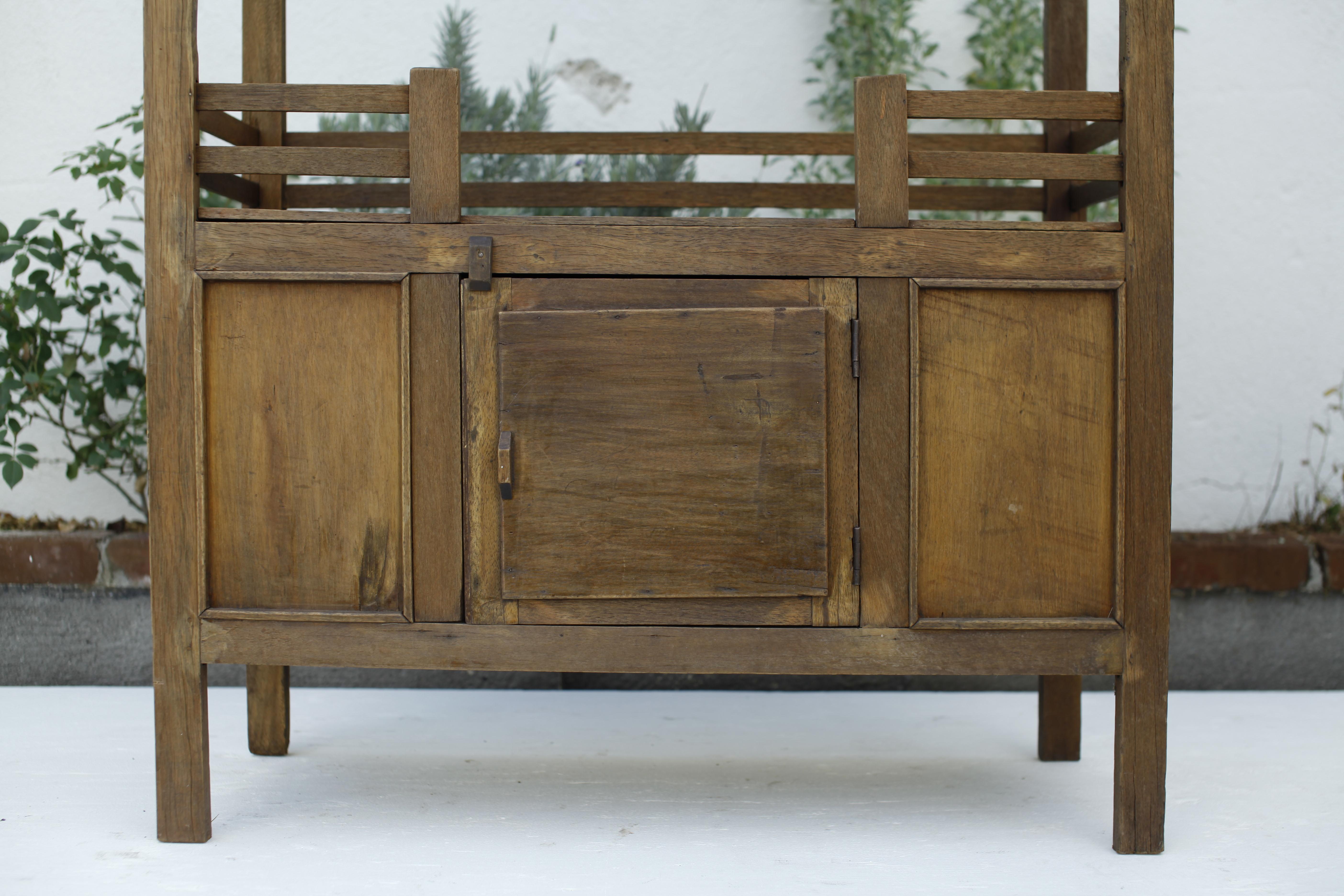 Vietnamese French Colonial Weathered Teak Cabinet with Metal Screen Doors 1930's For Sale
