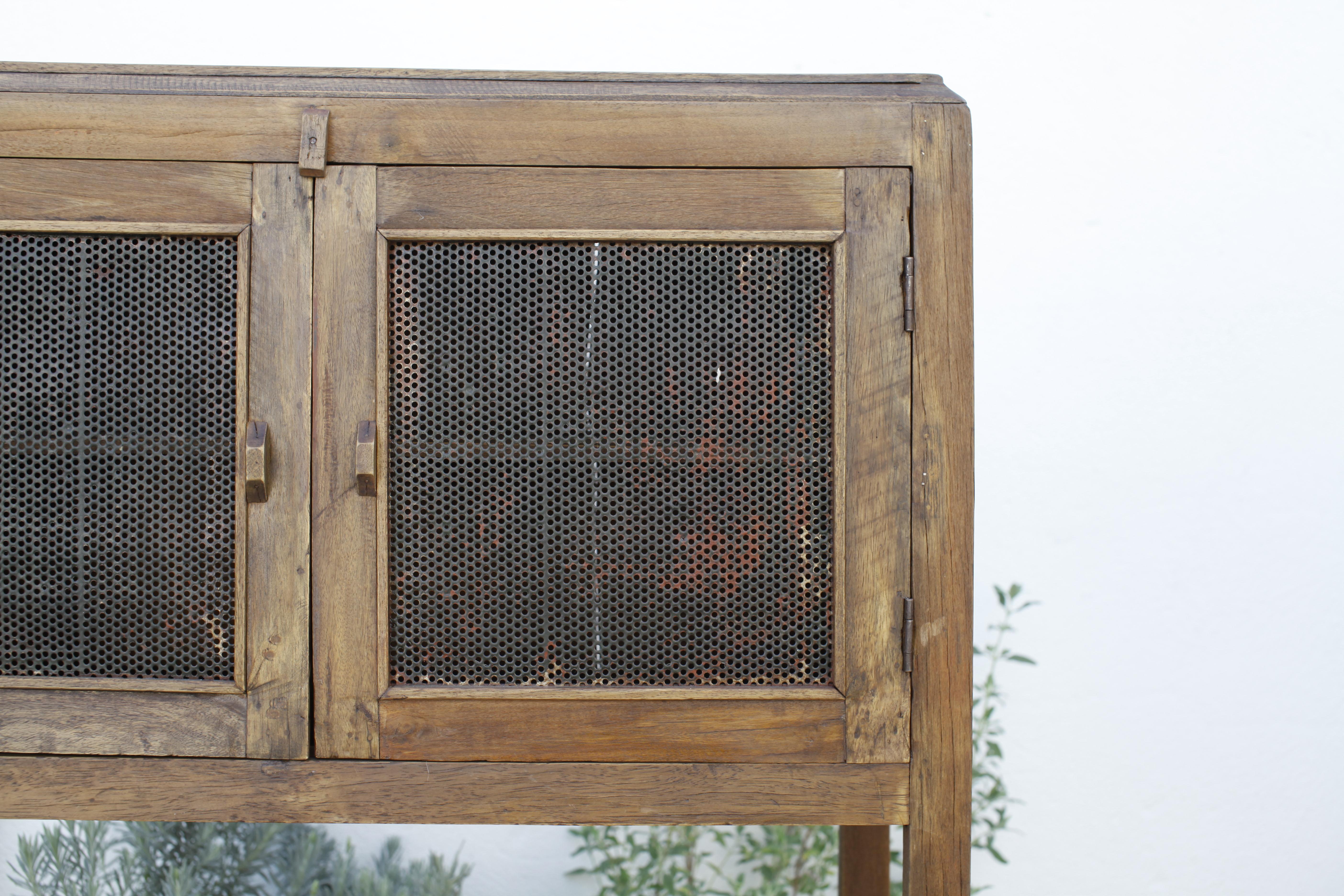 20th Century French Colonial Weathered Teak Cabinet with Metal Screen Doors 1930's For Sale