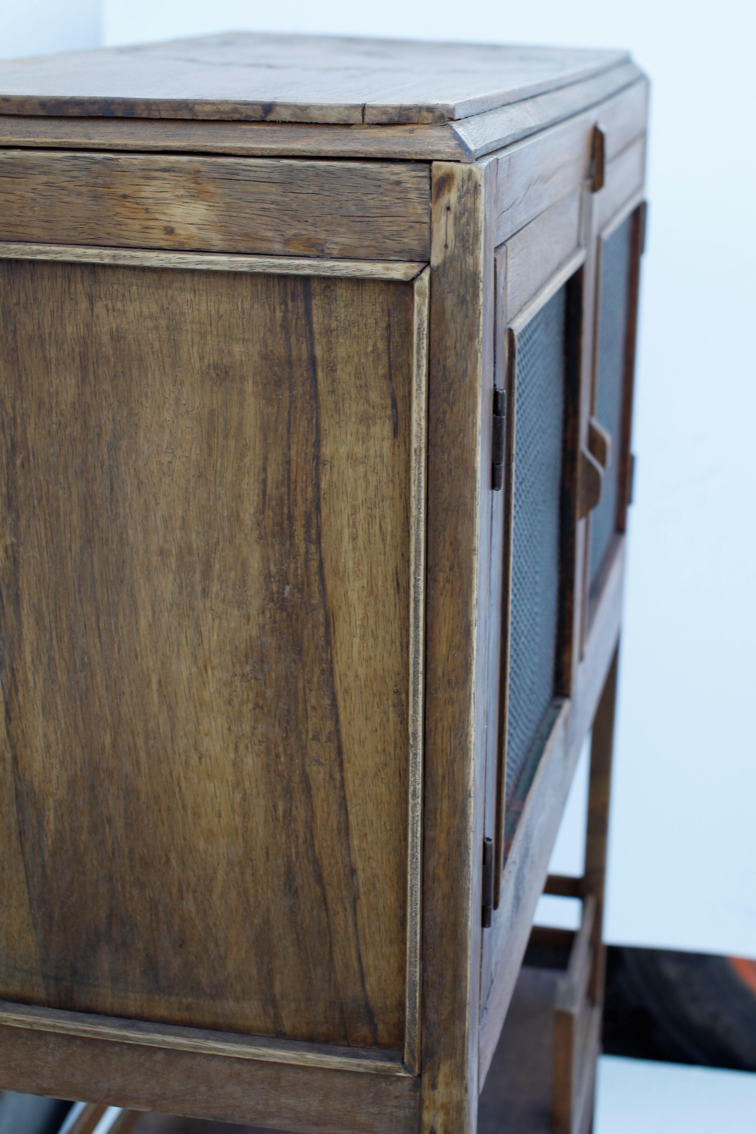 French Colonial Weathered Teak Cabinet with Metal Screen Doors 1930's For Sale 1