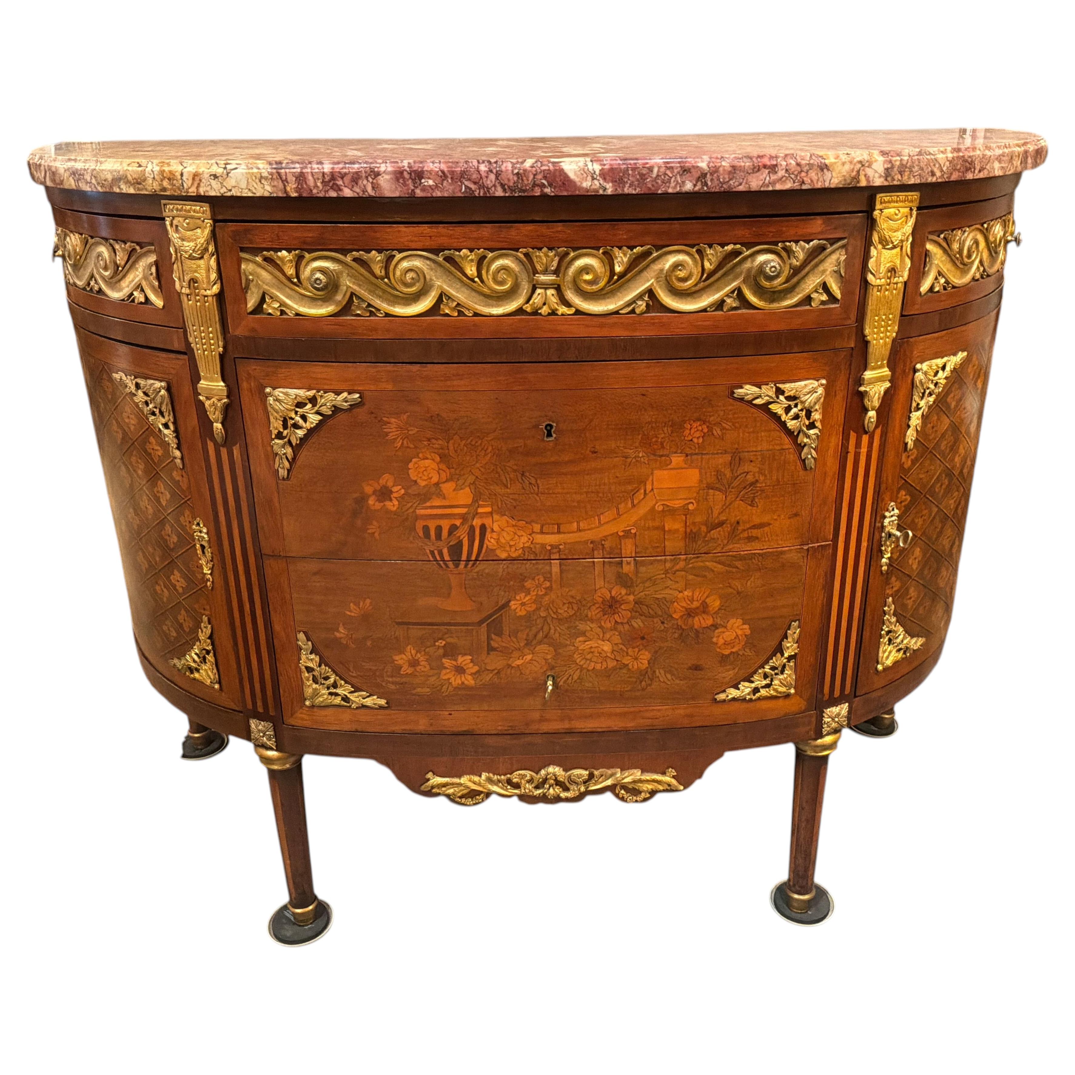 French commode in Demi lune shape, marble top with marquetry bronze dore mounts For Sale