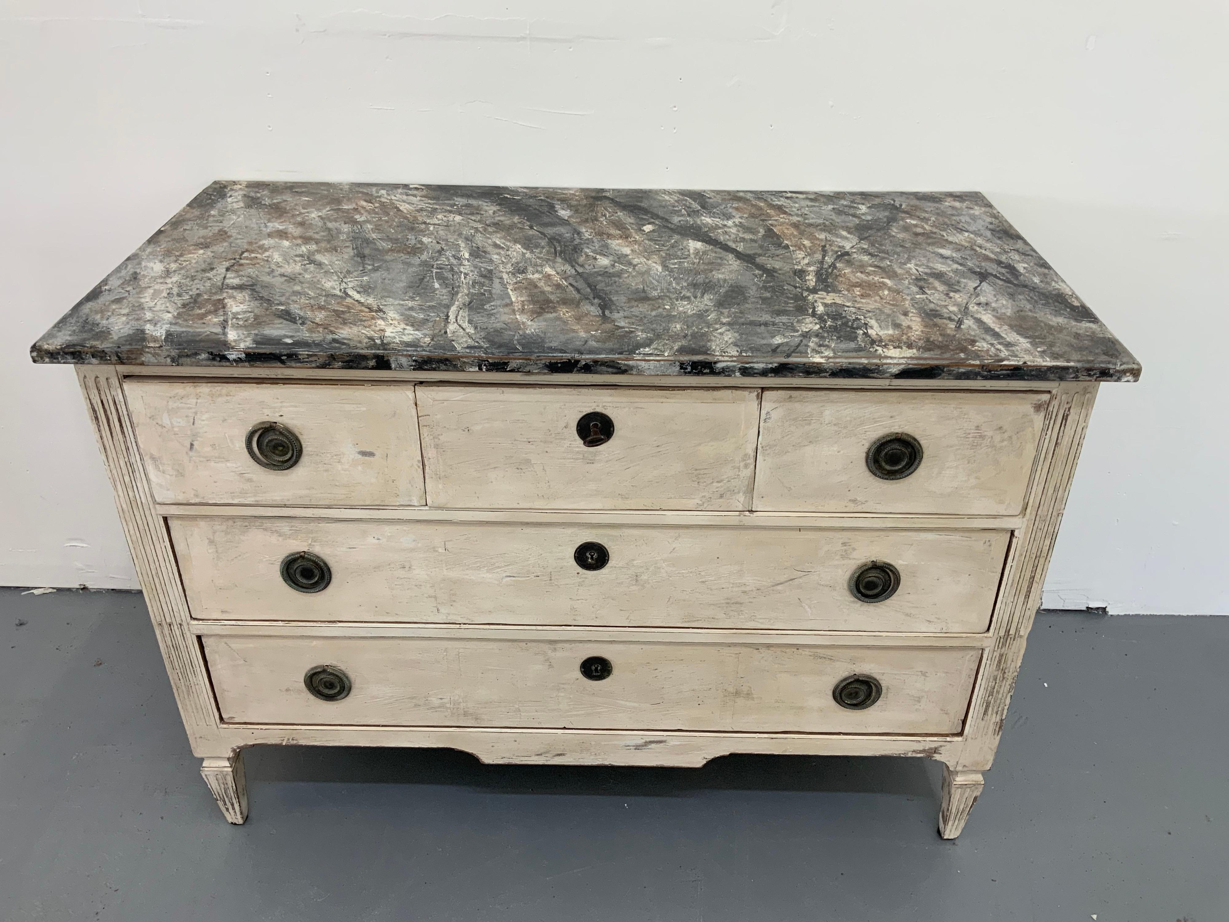 French antiques commode Louis XV style, 1850 with 5 drawers, made in walnut and patinated by Benoit, an interior designer based in France.