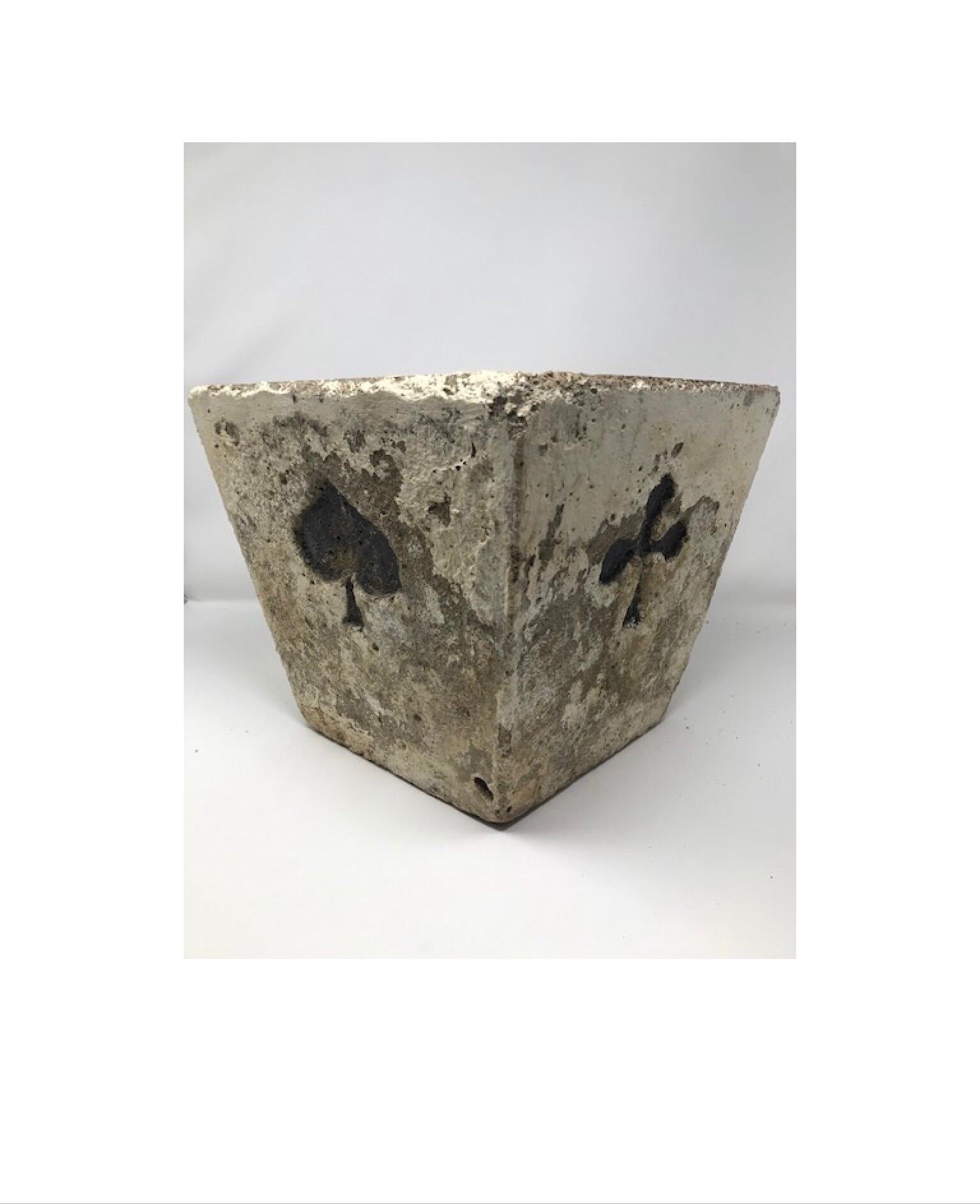 Wonderful French concrete planters with each of the card suits on the four sides. It is said that each of the suits on a deck of cards in a card game represents the four major pillars of the economy in the Middle Ages: Hearts represented the Church,