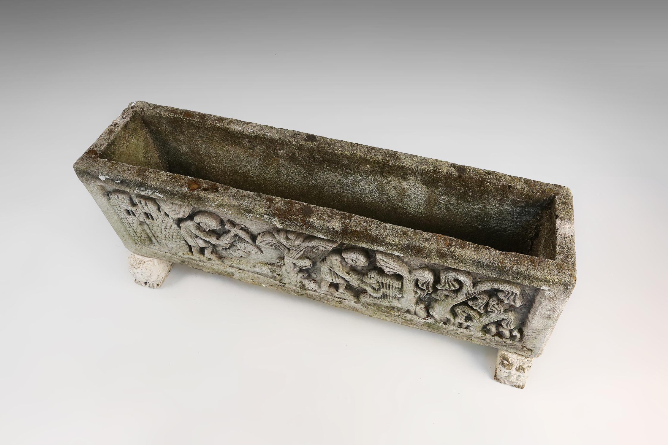 Early 20th Century French concrete planter with facade sculpted in Roman style, 1920s For Sale