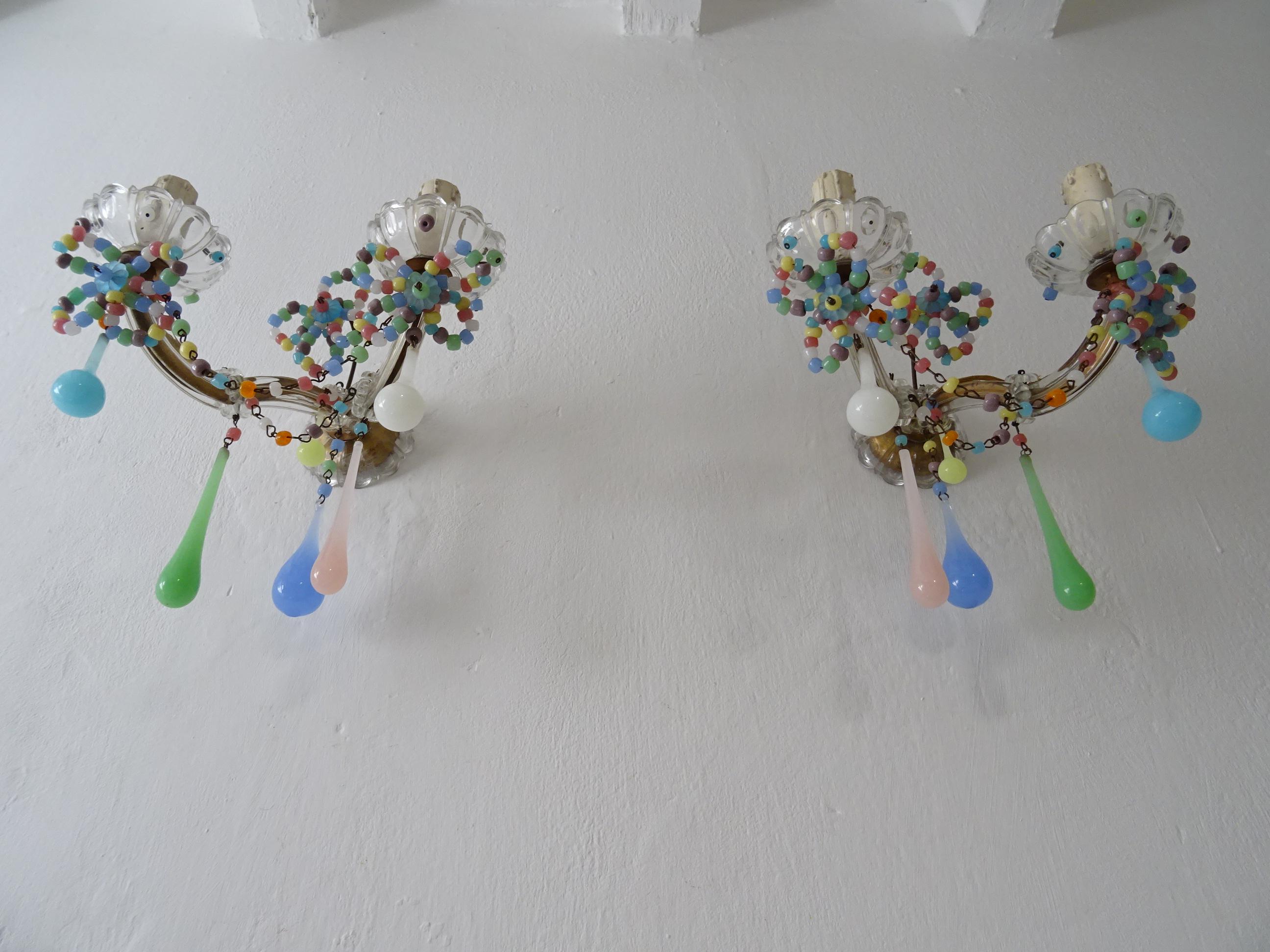 Housing two lights each, sitting in crystal bobeches with opaline beads. Will be rewired with certified UL US sockets for the USA, appropriate sockets for all other countries and ready to hang. These were made for a hotel in the South of France. 
