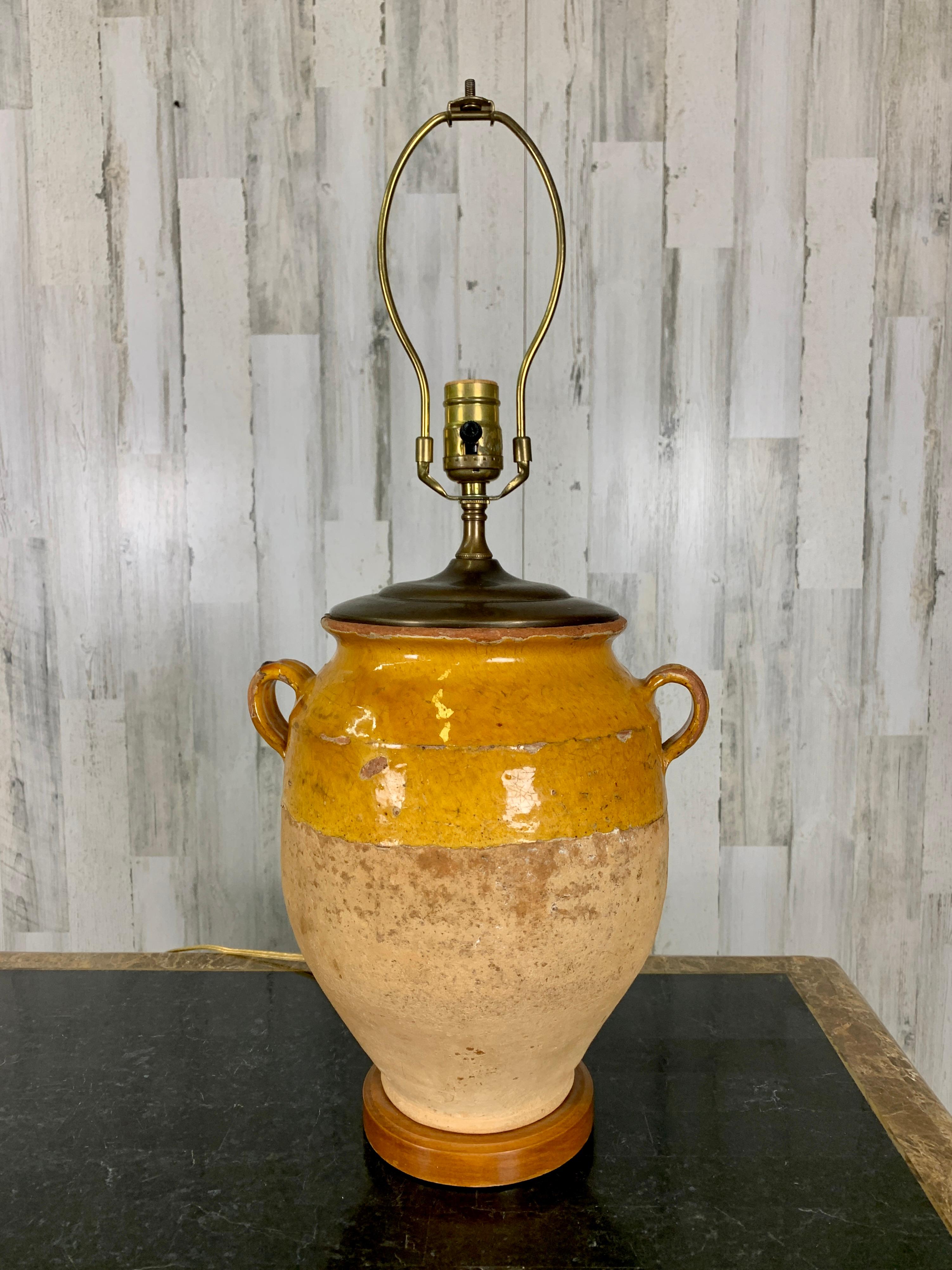 Antique ochre glaze confit pot with modern table lamp conversion.
This was originally used to store food in the cellar. Minor loss of glaze, please see pictures.