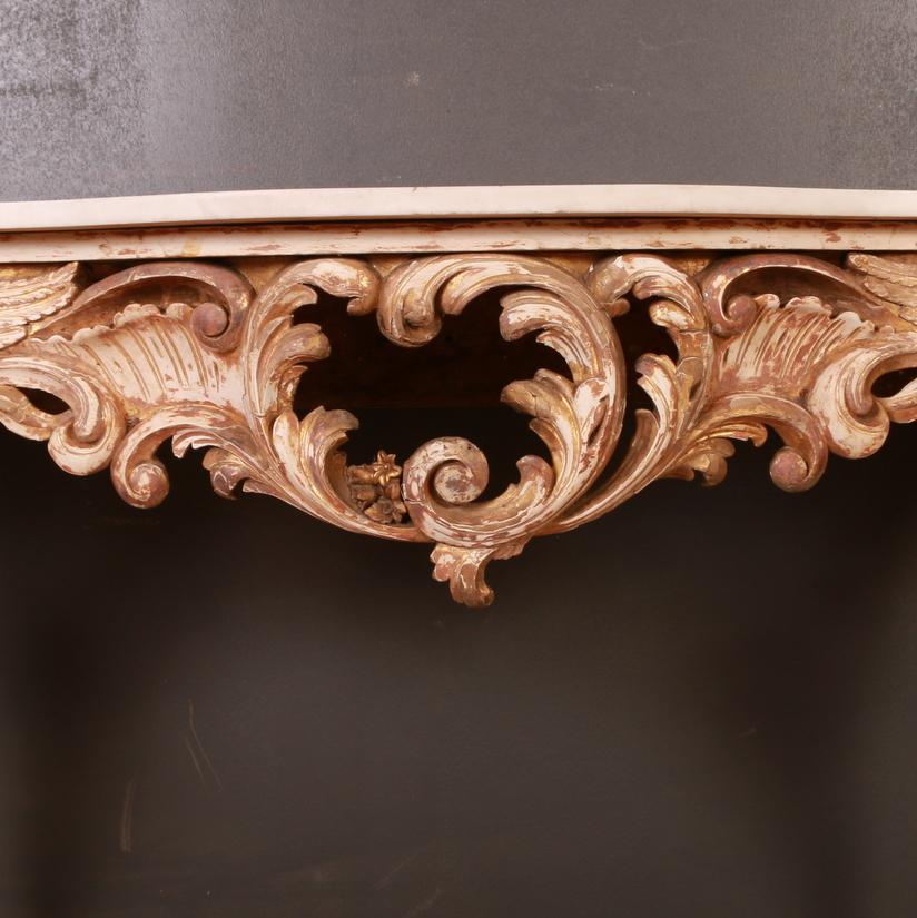 Fabulous 19th century serpentine front French console table with winged angels and a marble top, 1850

    

Dimensions:
76 inches (193 cms) wide
21.5 inches (55 cms) deep
35.5 inches (90 cms) high.