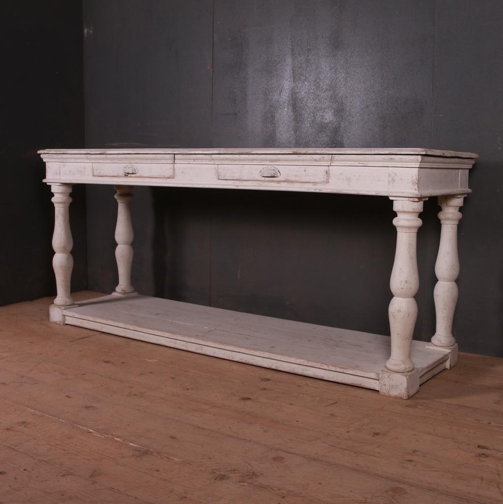 19th century painted pine French console table, 1840.

Dimensions:
79 inches (201 cms) wide
23.5 inches (60 cms) deep
34.5 inches (88 cms) high.