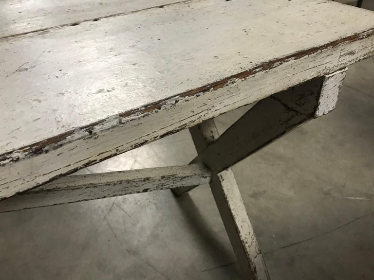 This rustic French table was purchased at an antique store in Beverly Hills in the 80’s. The patina on the painted surface is amazing. The table is functional and sturdy. I love the minimalist look it represents.