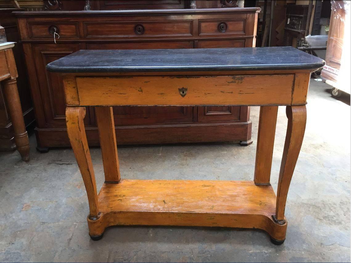 French console with painted wood and black marble top from 19th century.