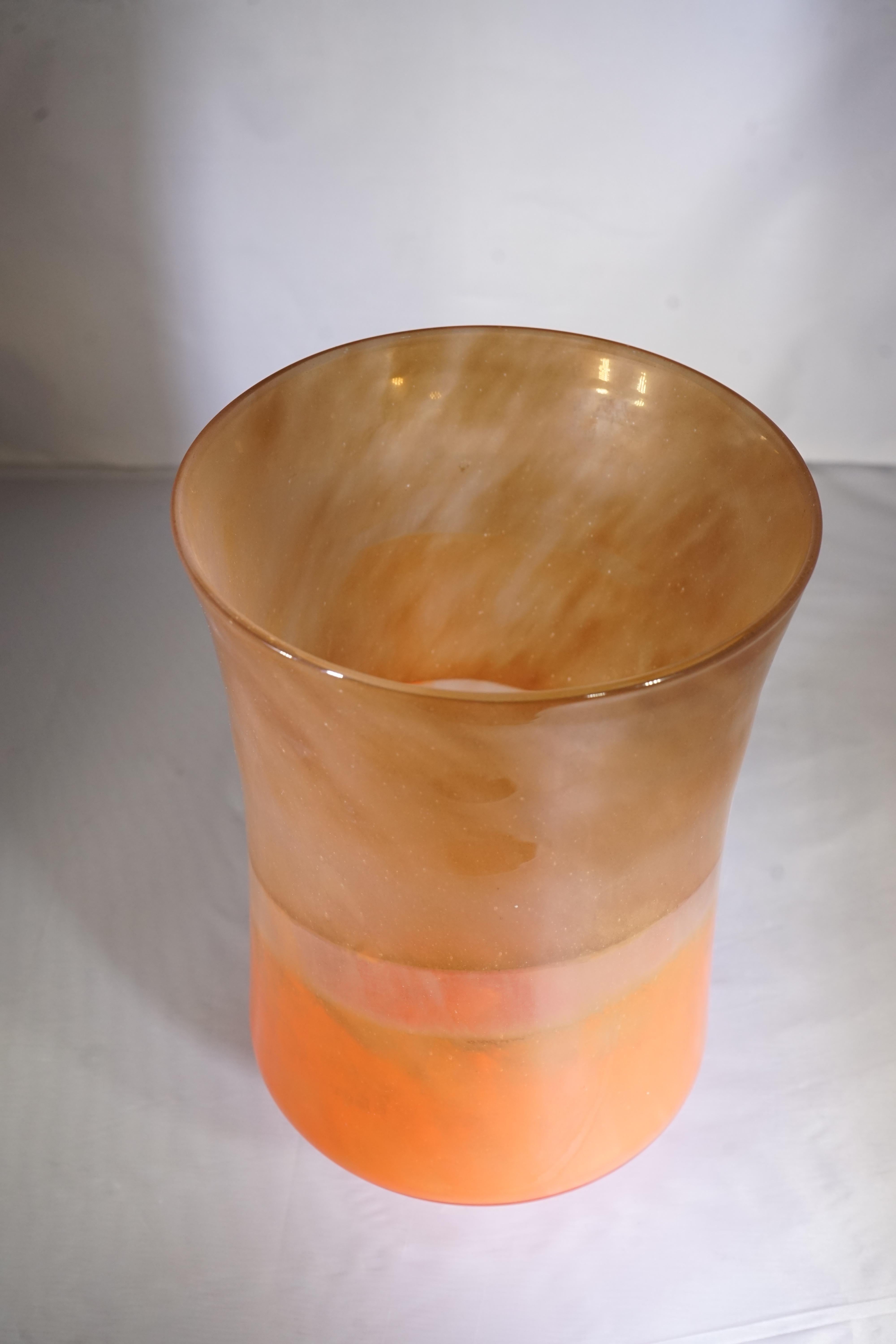 Contemporary French orange and amber colored glass vase.