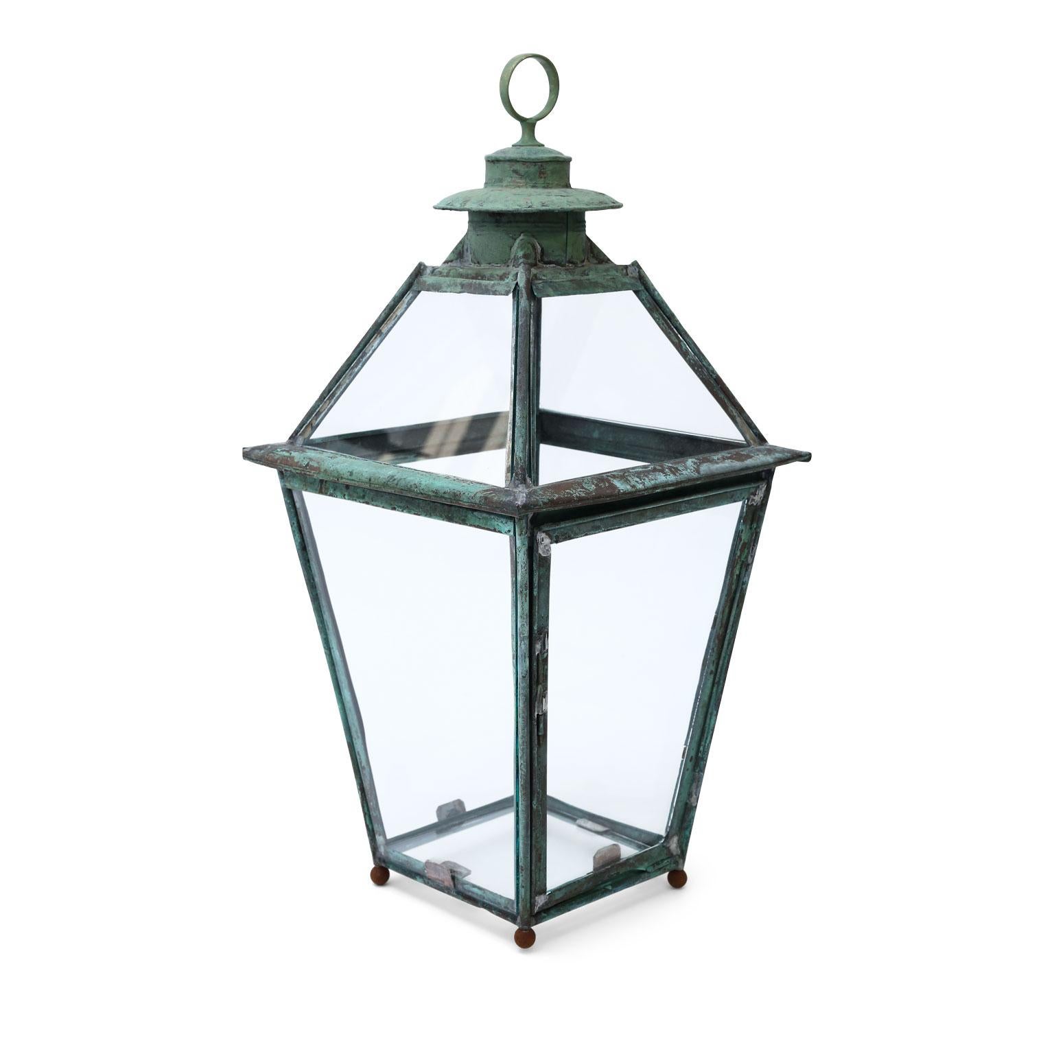 Green verdigris copper and brass French lantern with glass panels dating to the late 19th century. Can be wired for electricity or fitted for usage with gas for an additional cost.