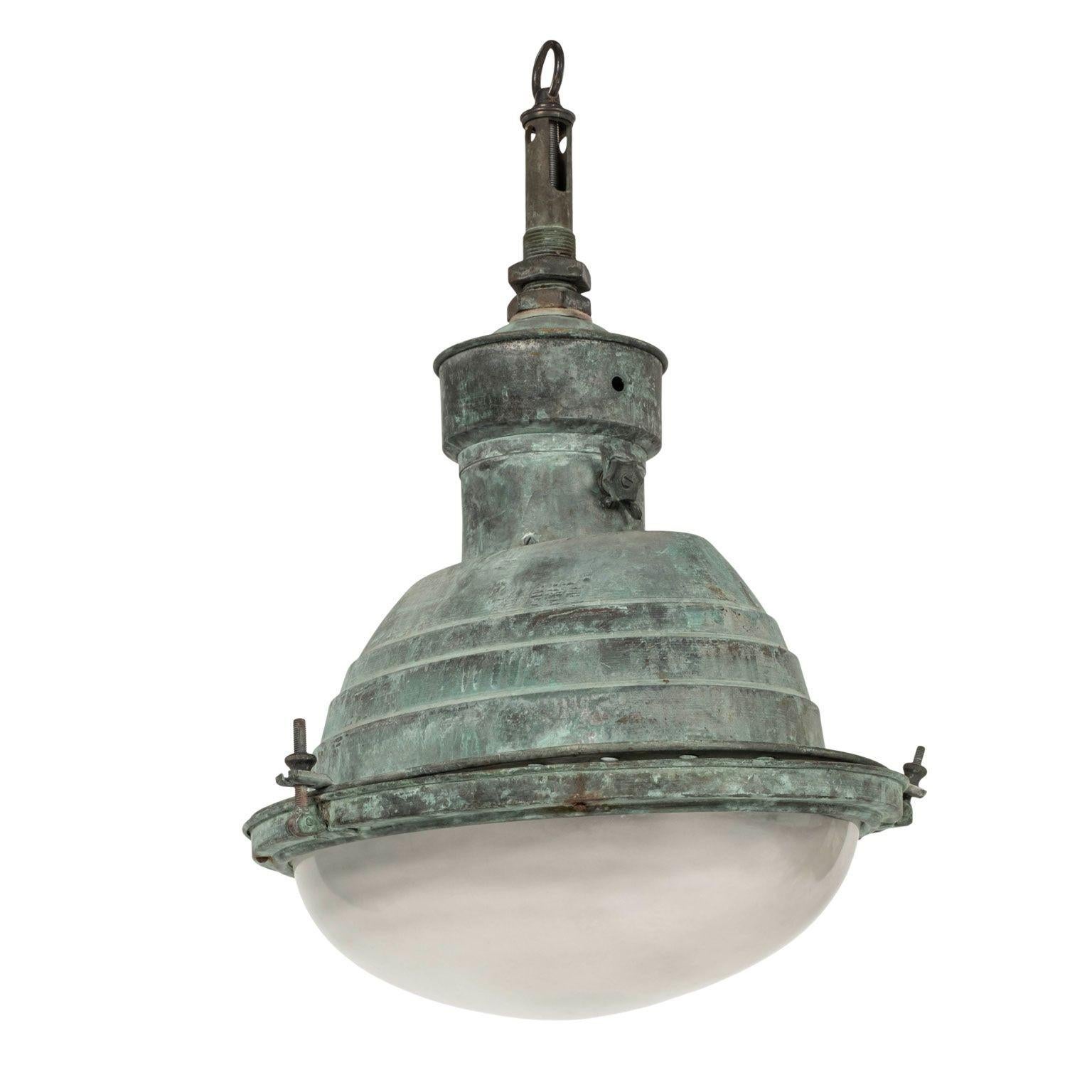 French copper and glass Art Deco pendant fixture. Circa 1920-1939. Frosted glass shade. Newly wired and electrified.

Note: Original/early finish on antique and vintage metal will include some, or all, of the following: patina, scaling, light rust,