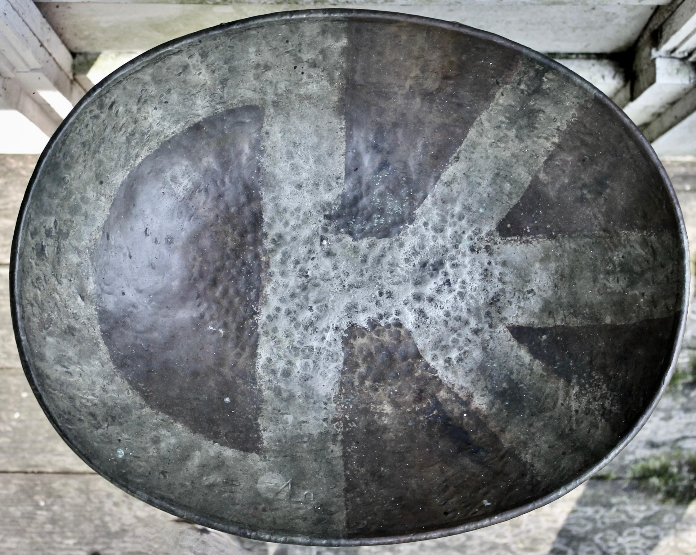 Hand wrought silver on copper bowl.  Signed.