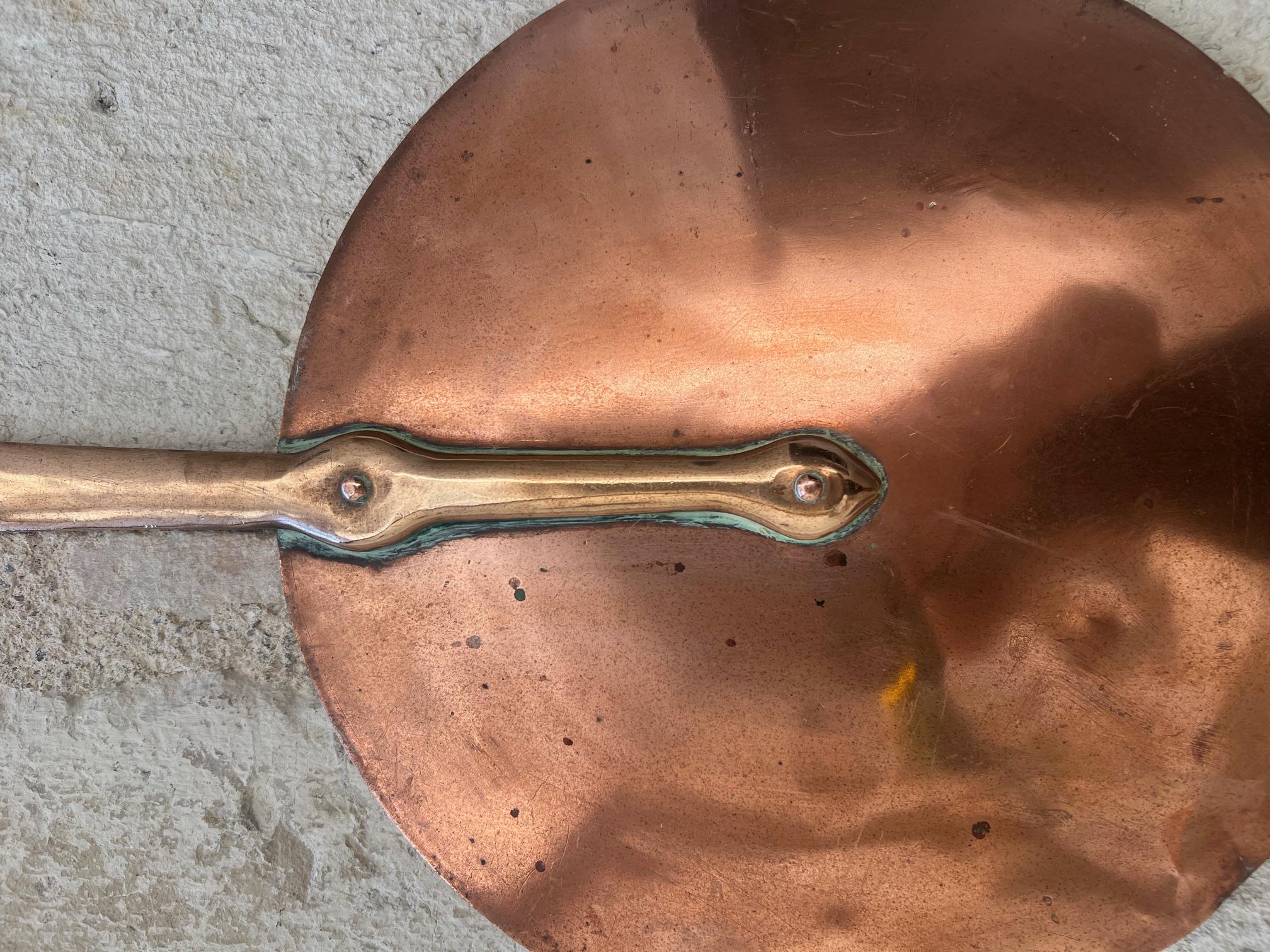 French Provincial copper lid, made in Lyon, France around 1910. The lid diameter is 10 inches.
