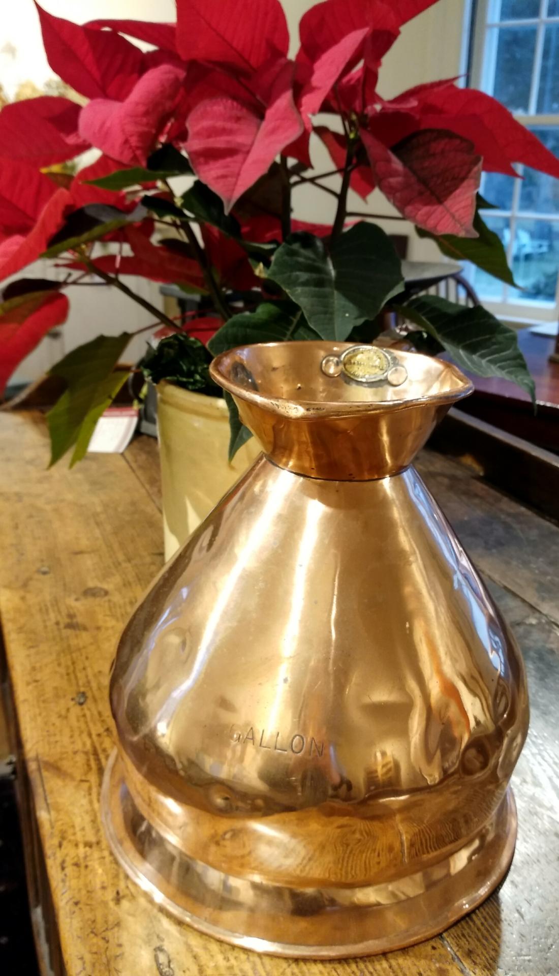 We love this bright, shiny object! There's something special about antique French copper -- it never fails to please. A perfect home accent or a great gift. This gallon-sized pitcher has great proportions, with a nice stamped metal detail inside the