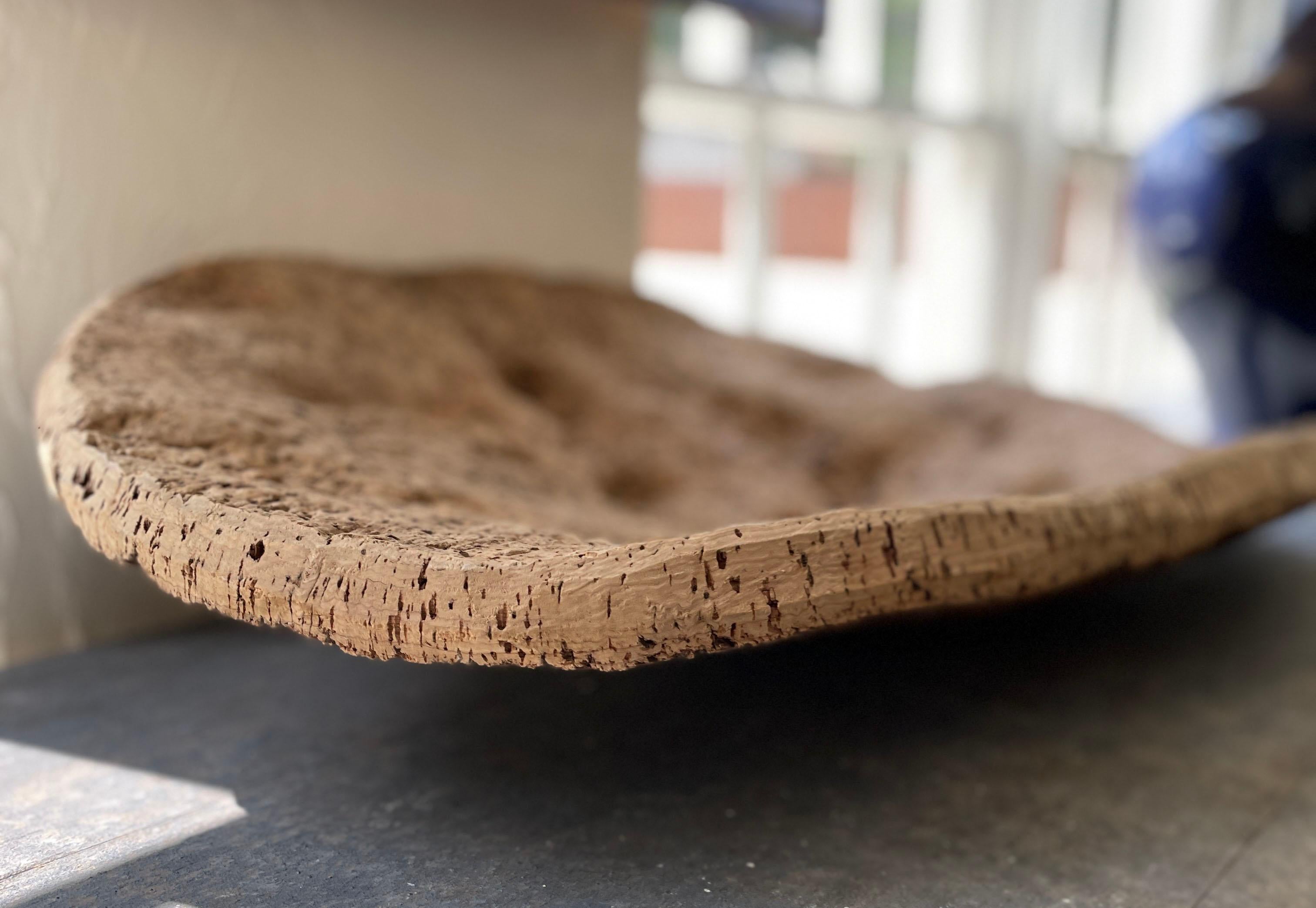 Beautiful oval shaped French cork bowl or tray. The cork is mid-century and works beautifully as a dining room table centerpiece or a coffee table item of interest. We have it filled with alabaster grapes in our store and it looks wonderful!